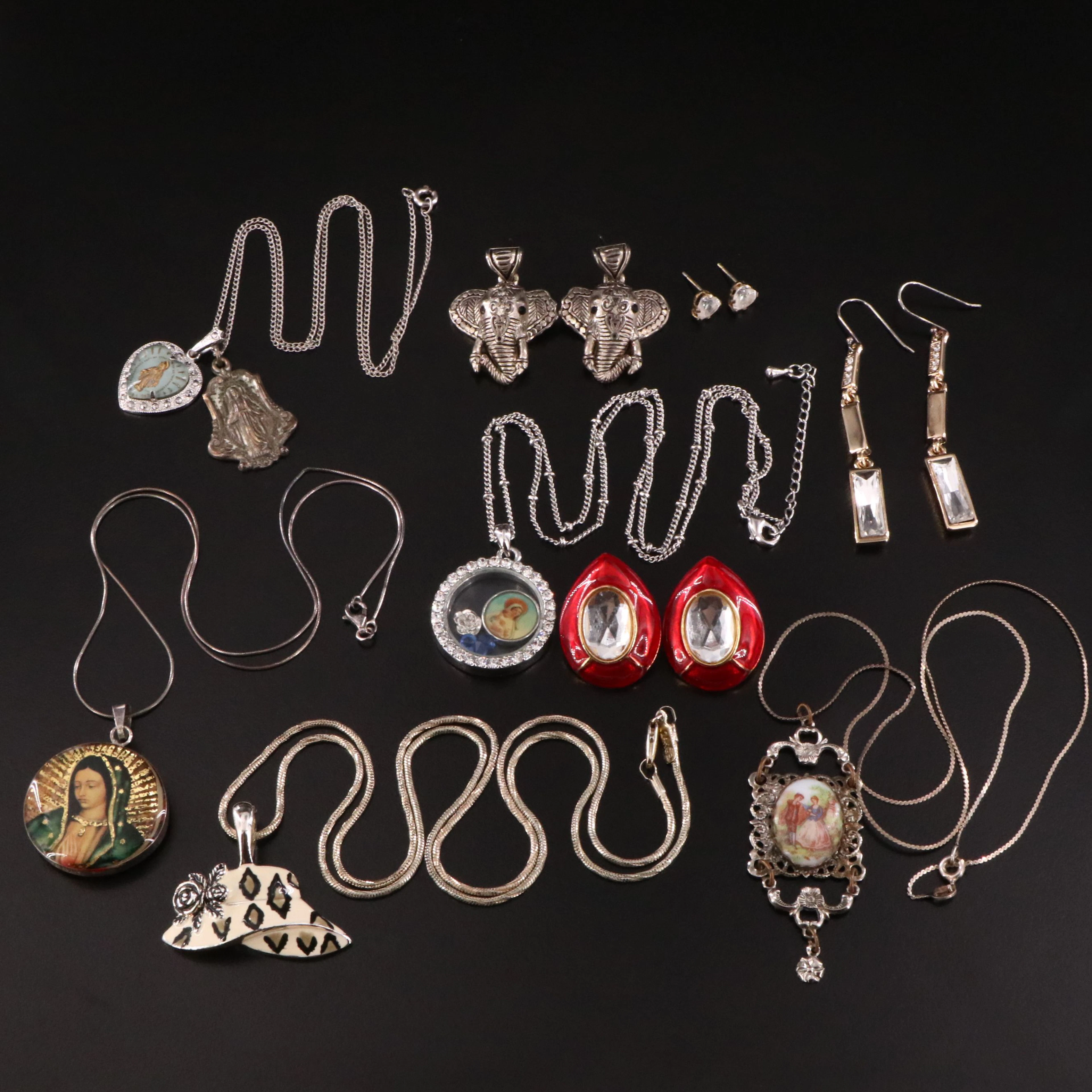 Sterling, Ecclesiastical and Rhinestones Featured in Jewelry