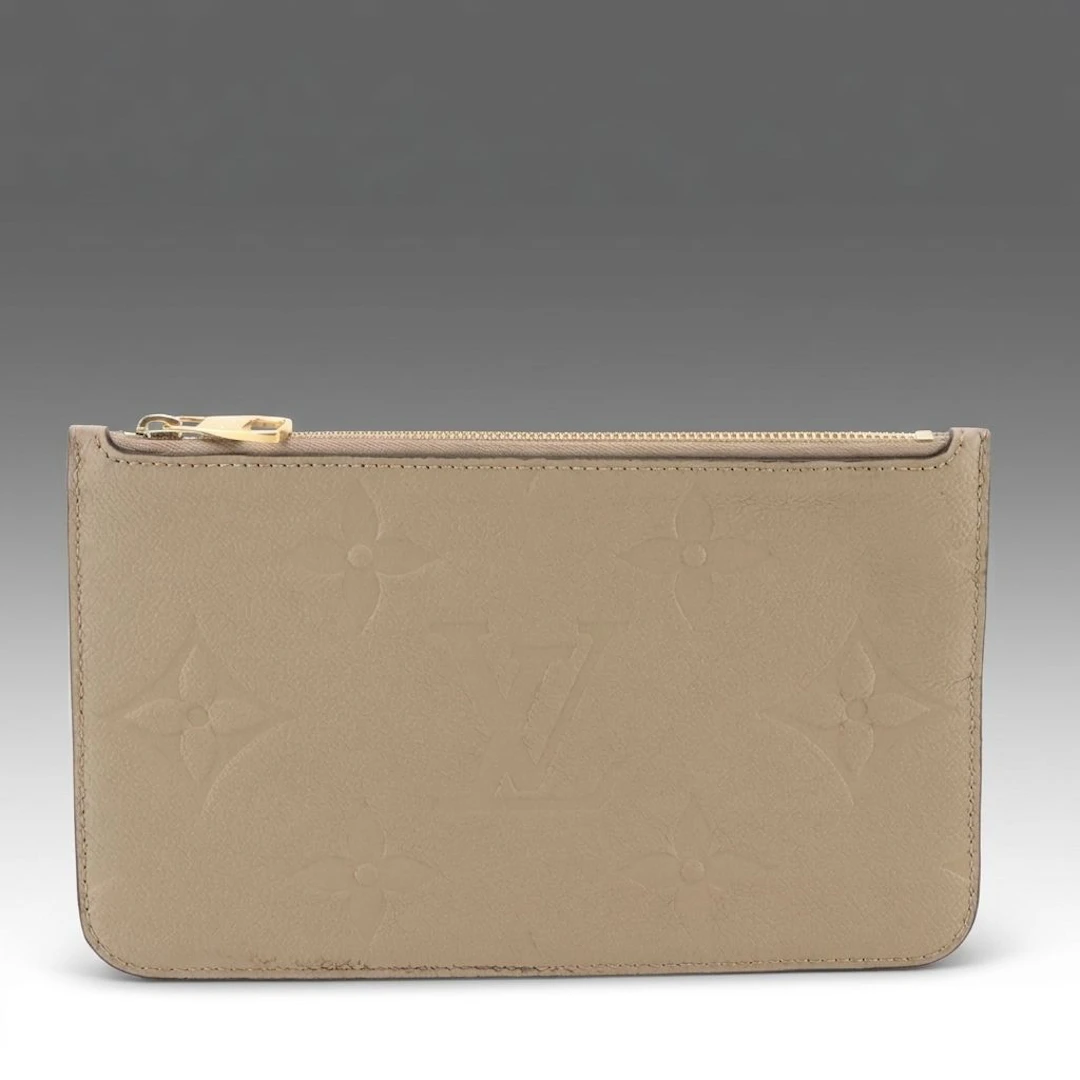 Louis Vuitton Neverfull MM Pochette in Giant Monogram Empreinte Leather