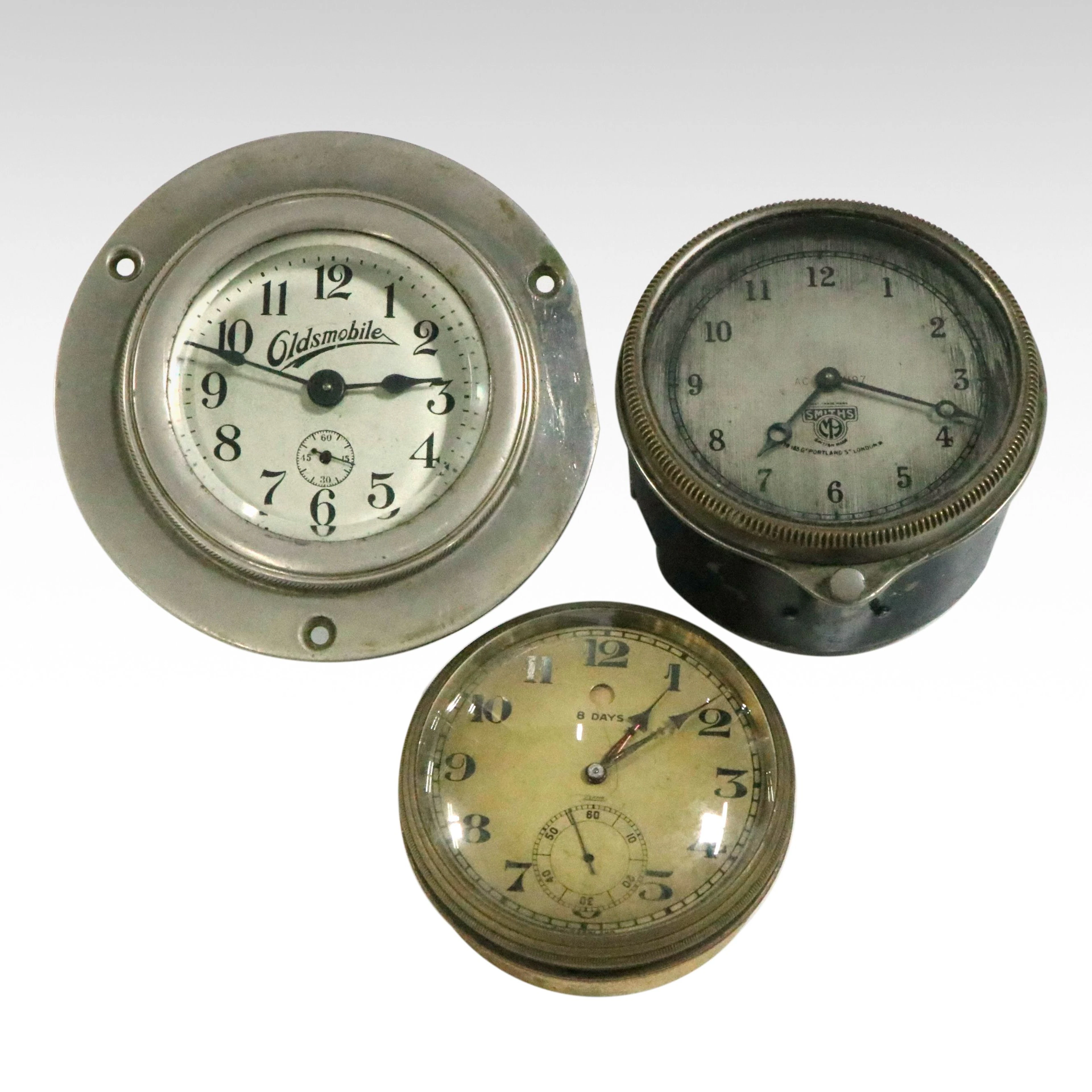 Oldsmobile with Other Car Dashboard and Art Deco Style Clocks