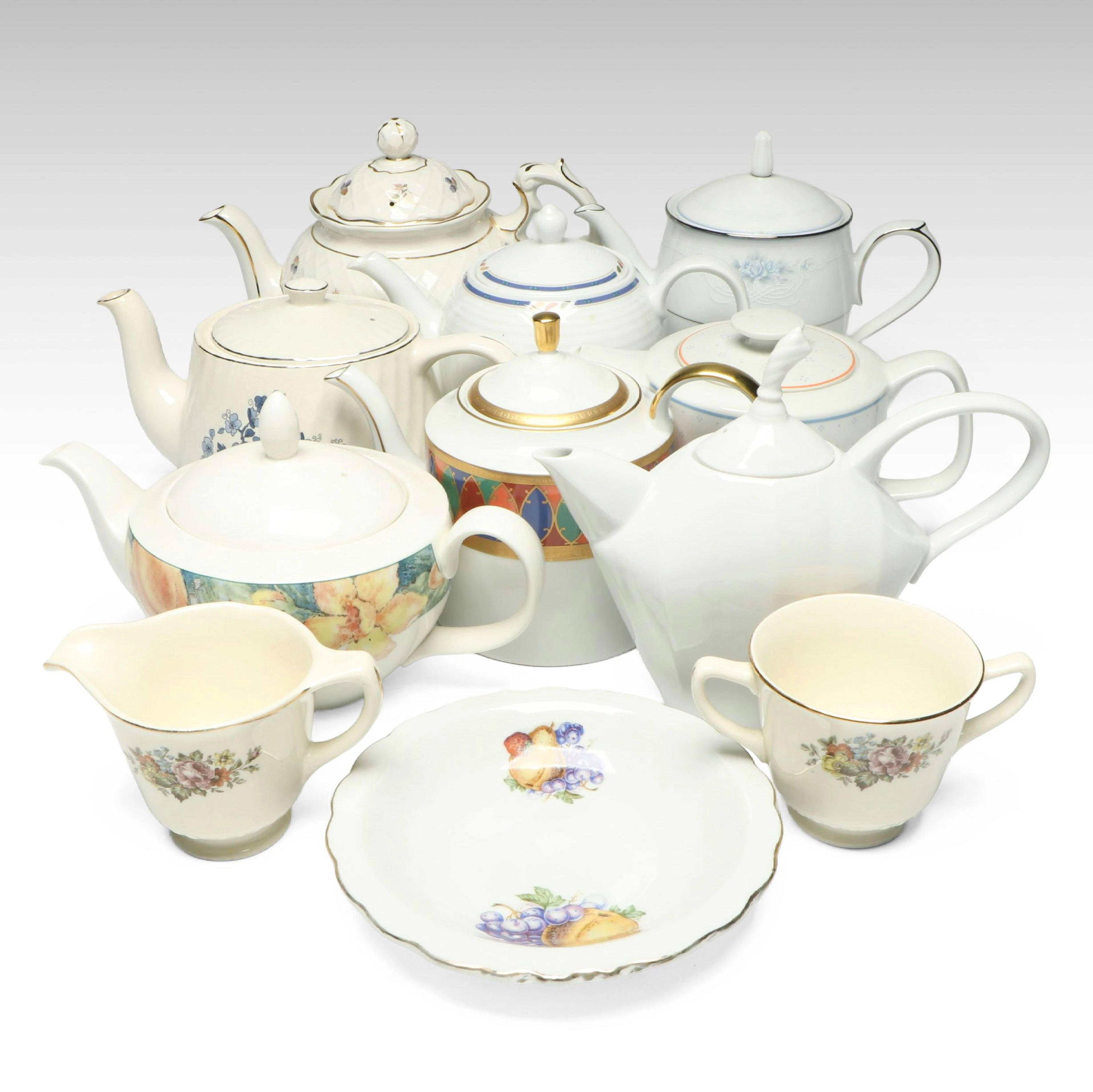 Noritake and Other Ceramic Teapots with Homer Laughlin Creamer and Sugar