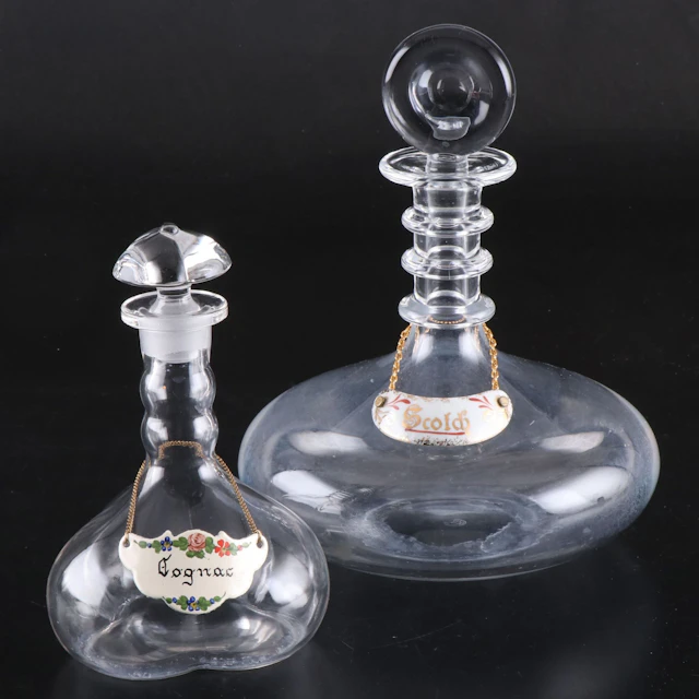 Baccarat and Other Crystal Decanter with Porcelain and Enameled Bottle Tags