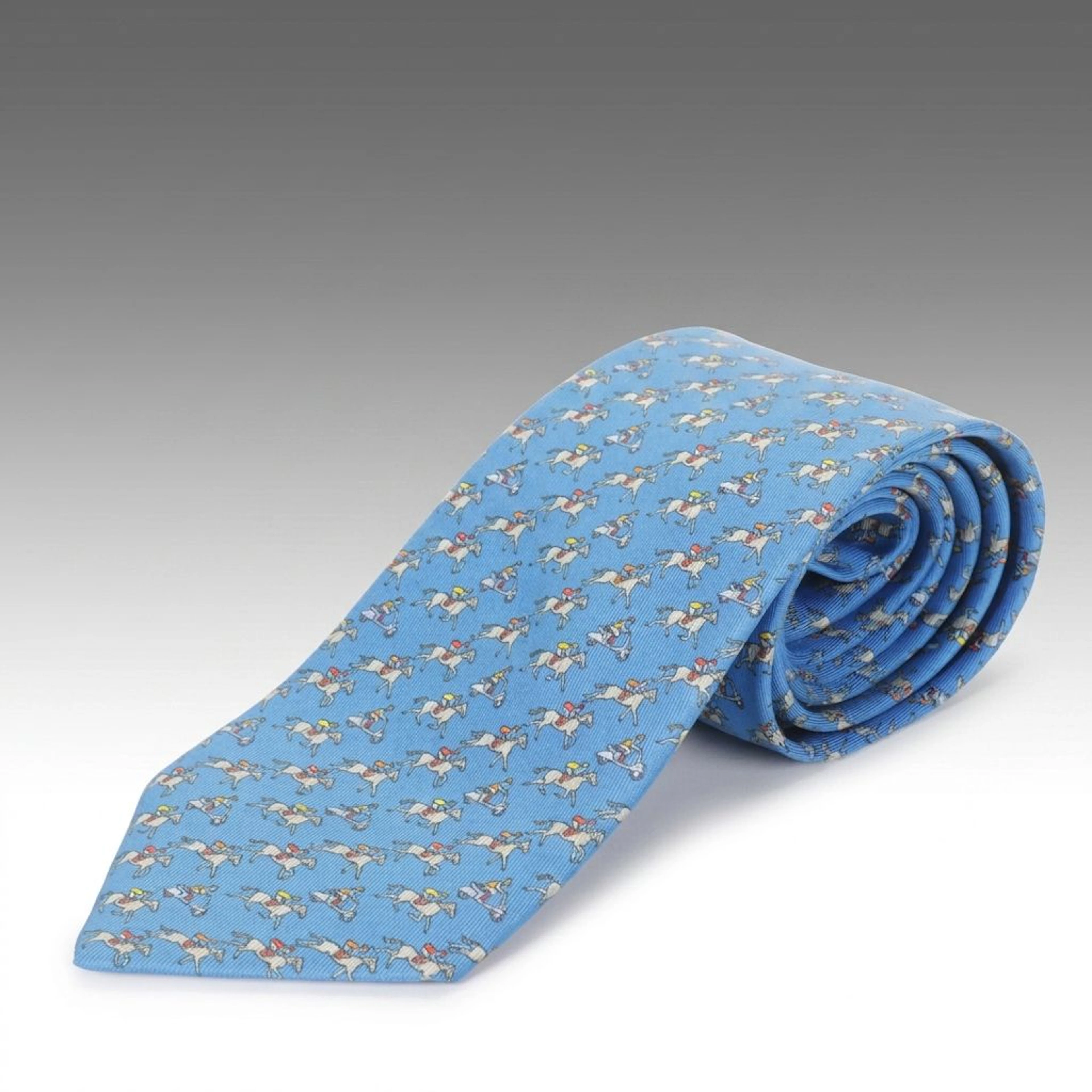 Hermès Silk Neck Tie in Blue "Mopeds" Pattern