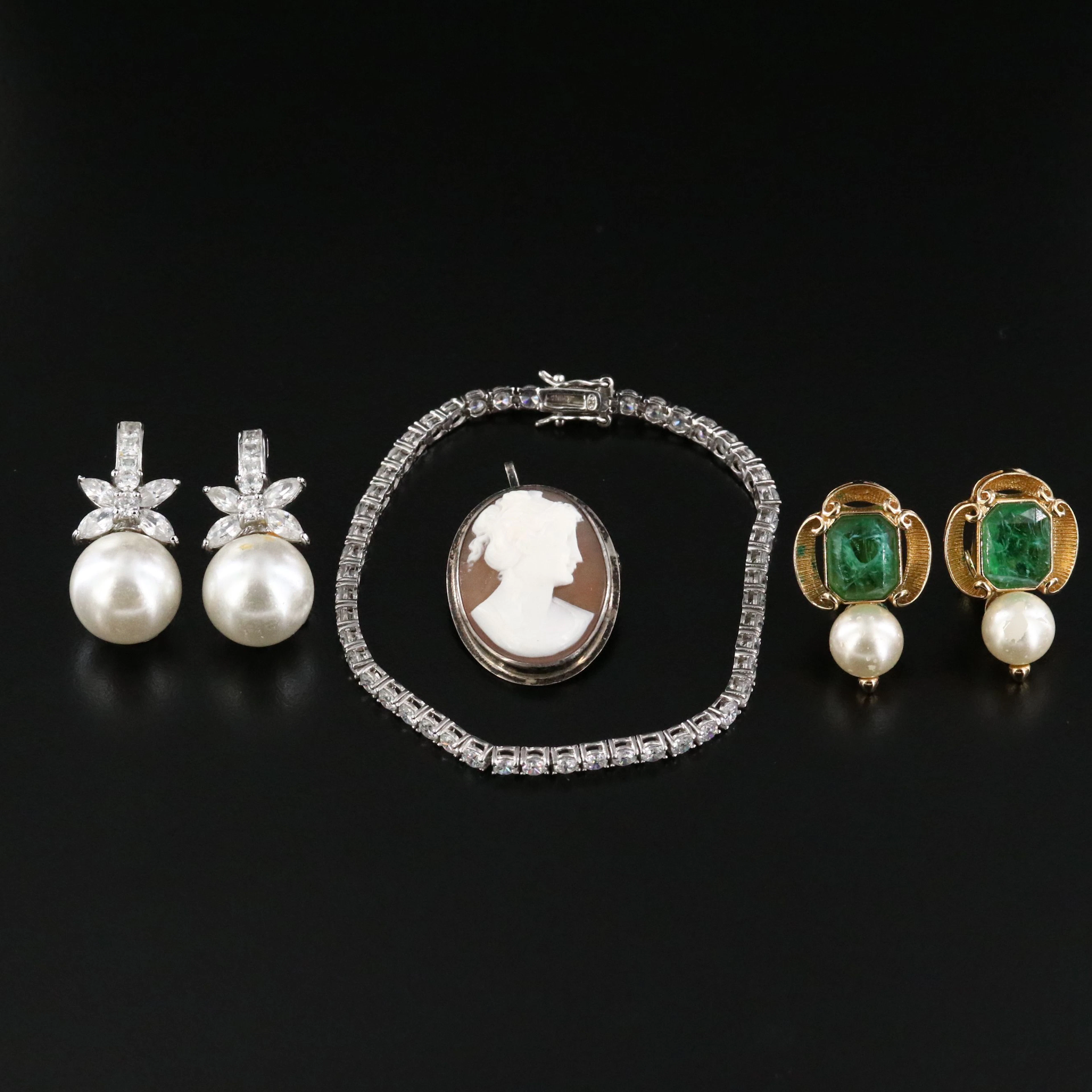 Sterling and 900 Silver Shell Cameo Featured in Jewelry