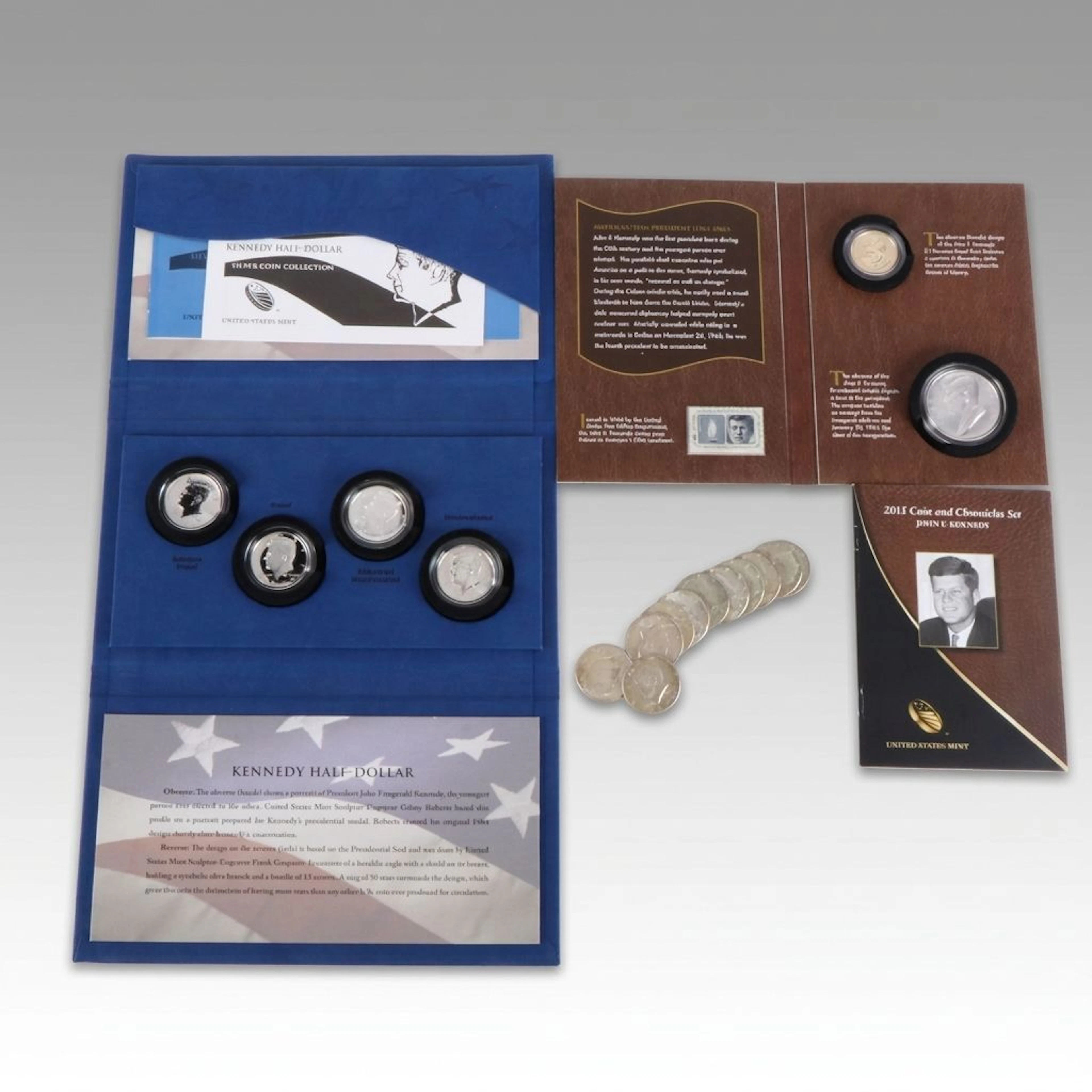 Two JFK U.S. Mint Silver Coin Sets and Eleven Silver Kennedy Half Dollars
