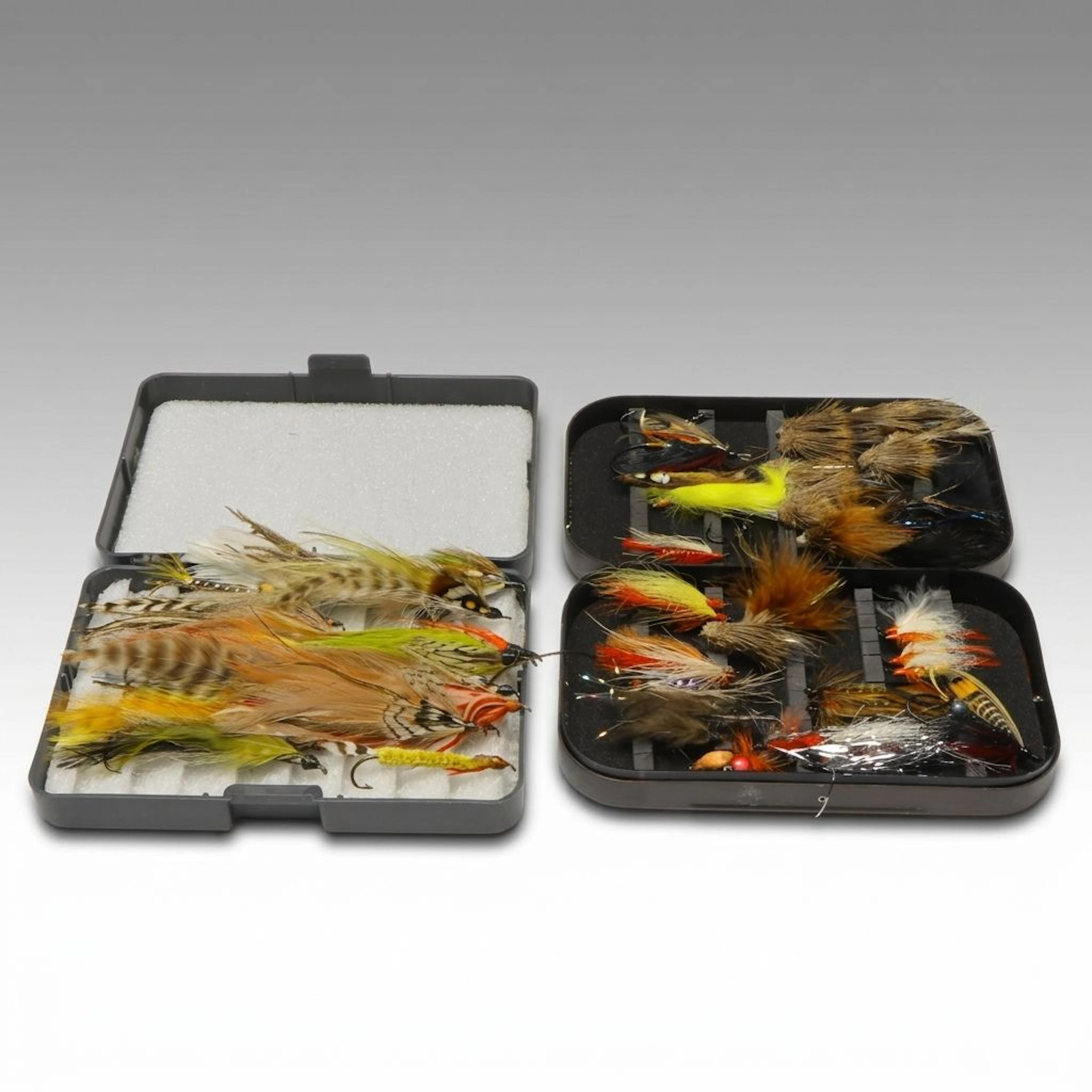 Hand-Tied Hair-Wing and Feather-Wing Fly Fishing Flies in Tackle Boxes