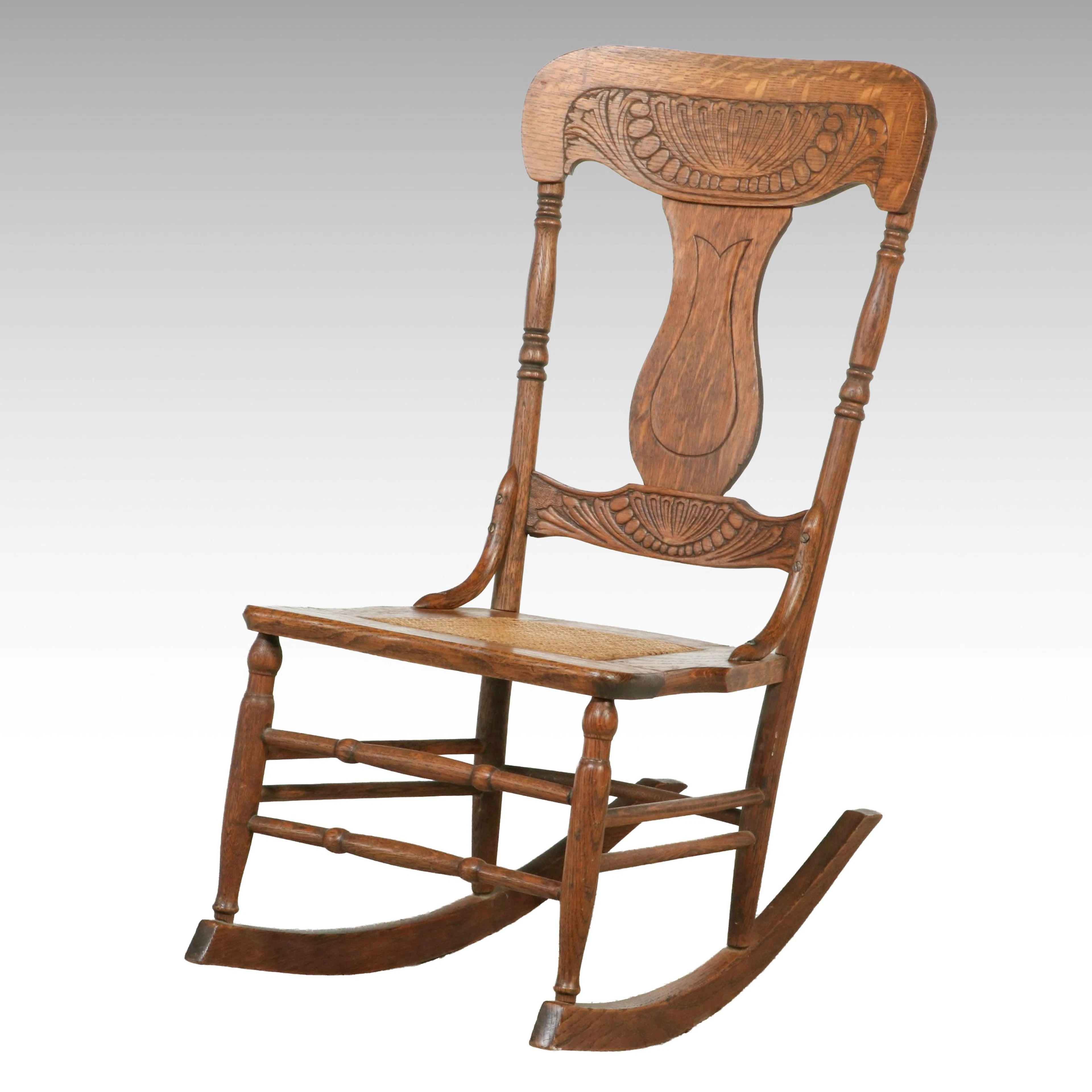 Late Victorian Pressed Oak Rocking Chair with Cane Seat
