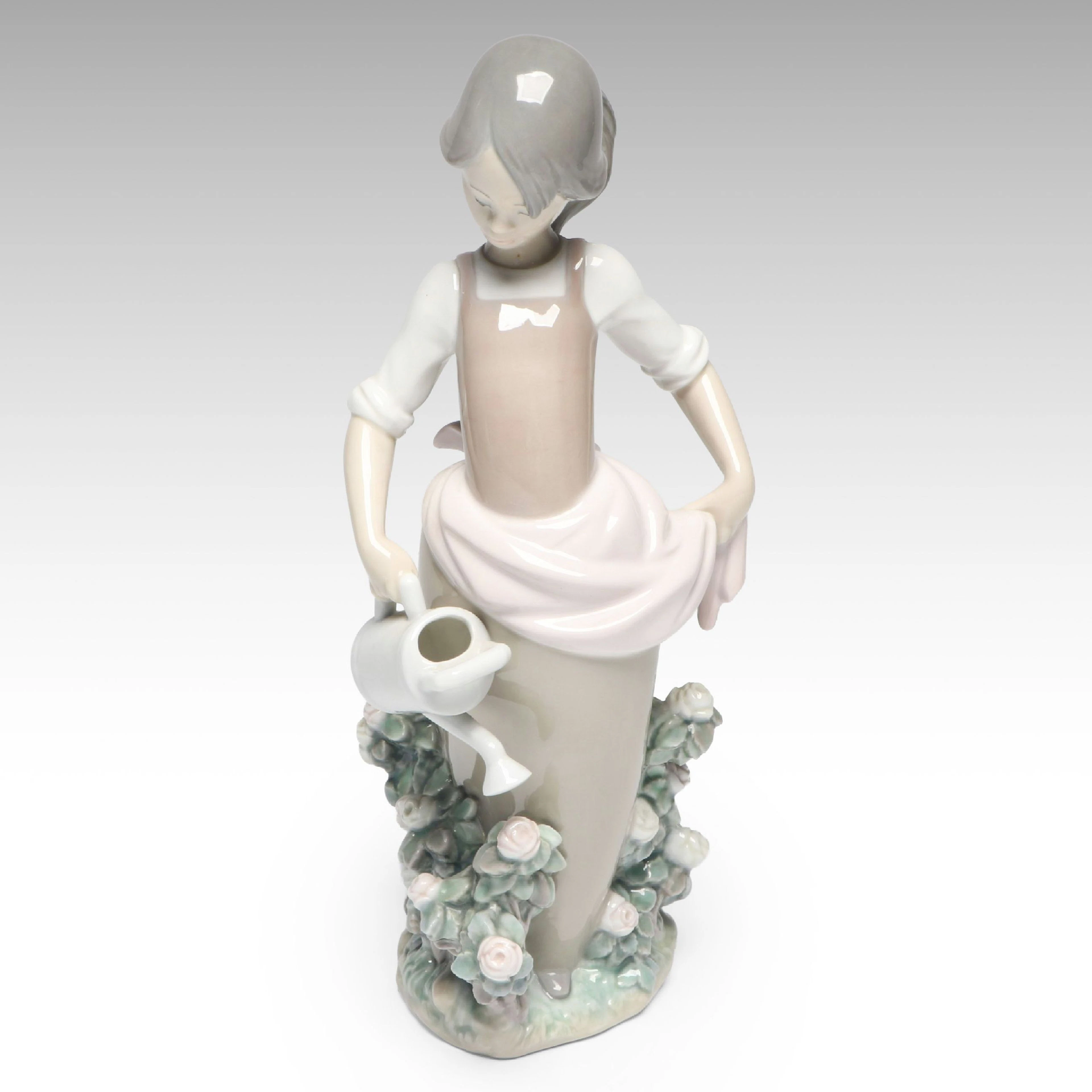 Lladró "Girl with Watering Can" Spanish Porcelain Figurine, Late 20th C.