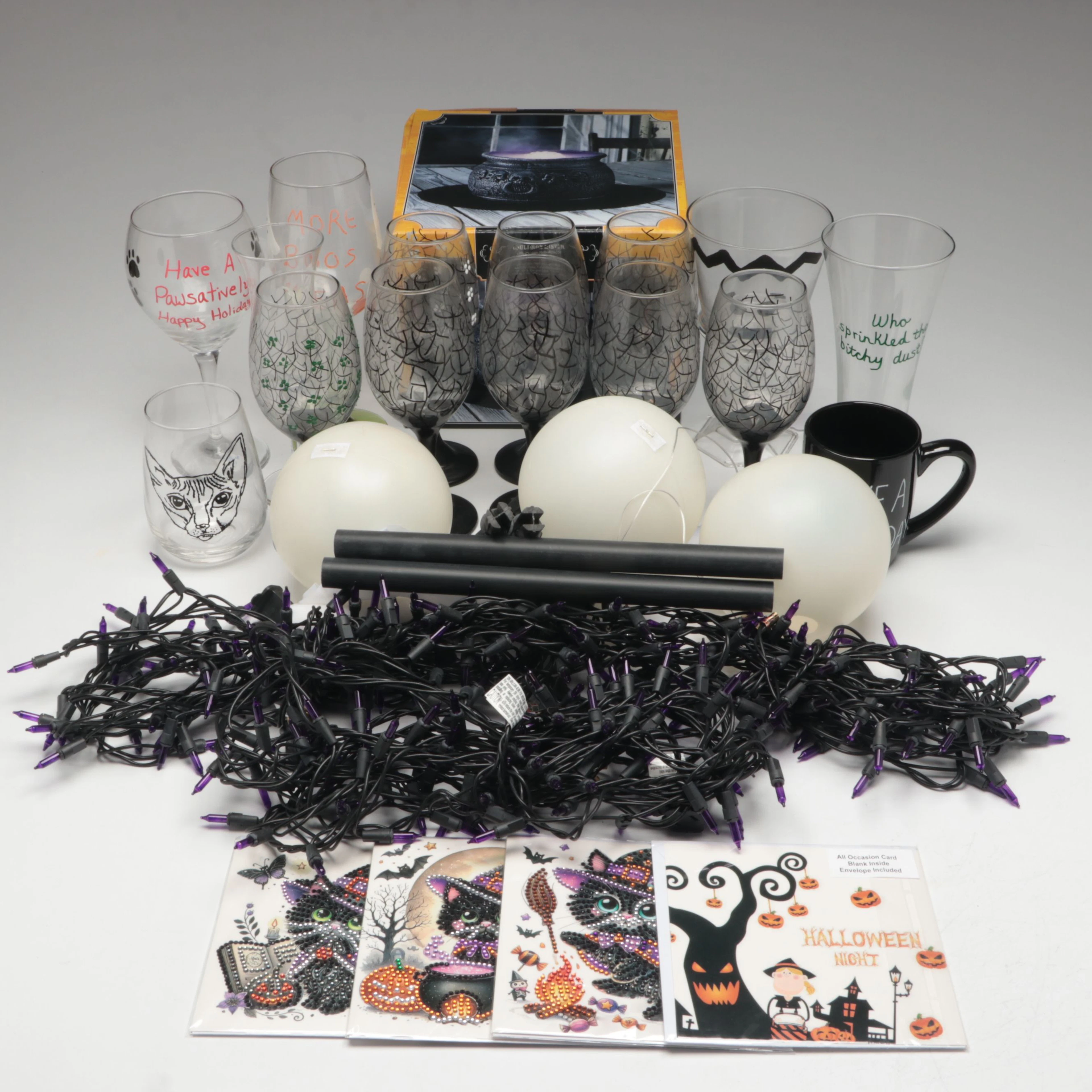 Halloween Misting Cauldron, Purple String Lights, and More Halloween Décor