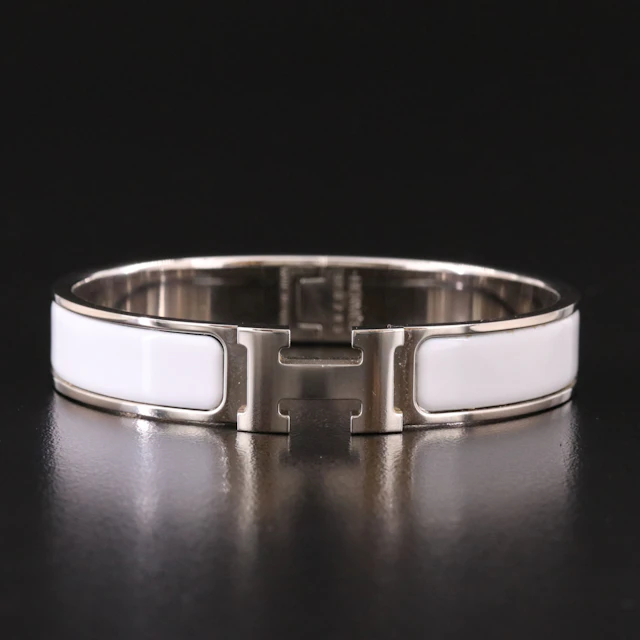 Hermès Clic H Bracelet in Silver Tone and White Enamel