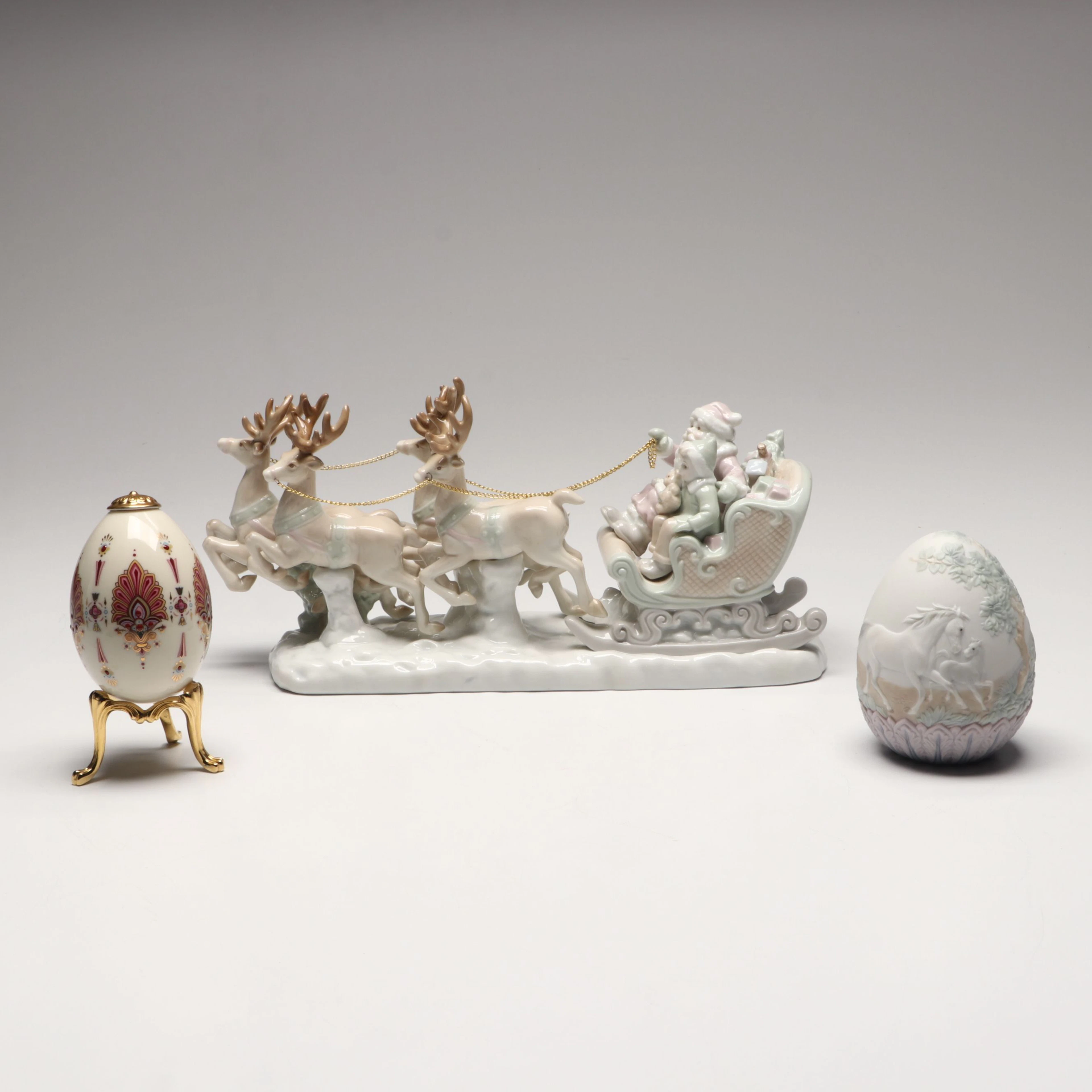 Lenox "Ruby" and Lladró Porcelain Eggs with Russ Santa's Sleigh Figurine