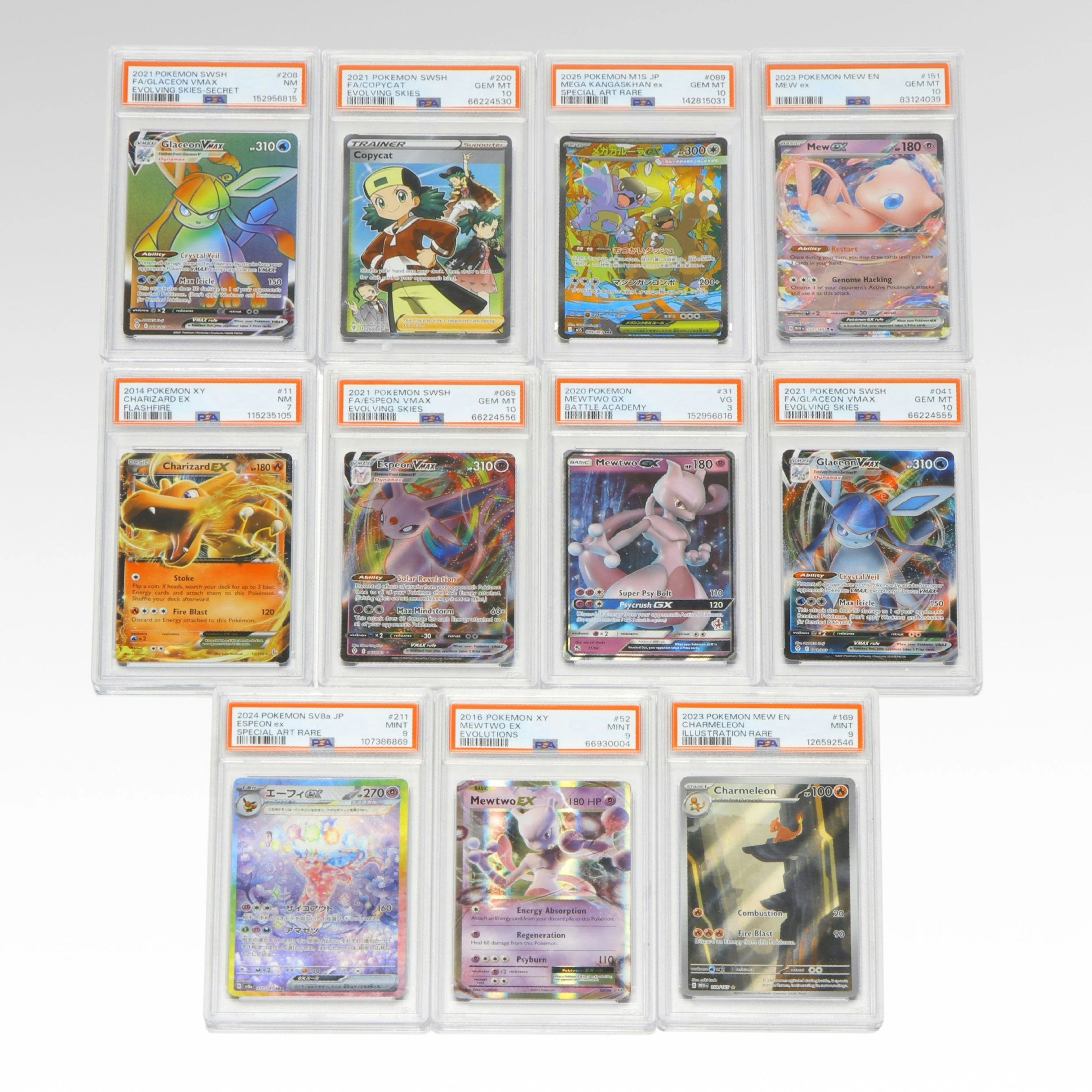 PSA Graded Pokémon Cards Featuring Charizard, Mewtwo, Espeon VMAX, and More