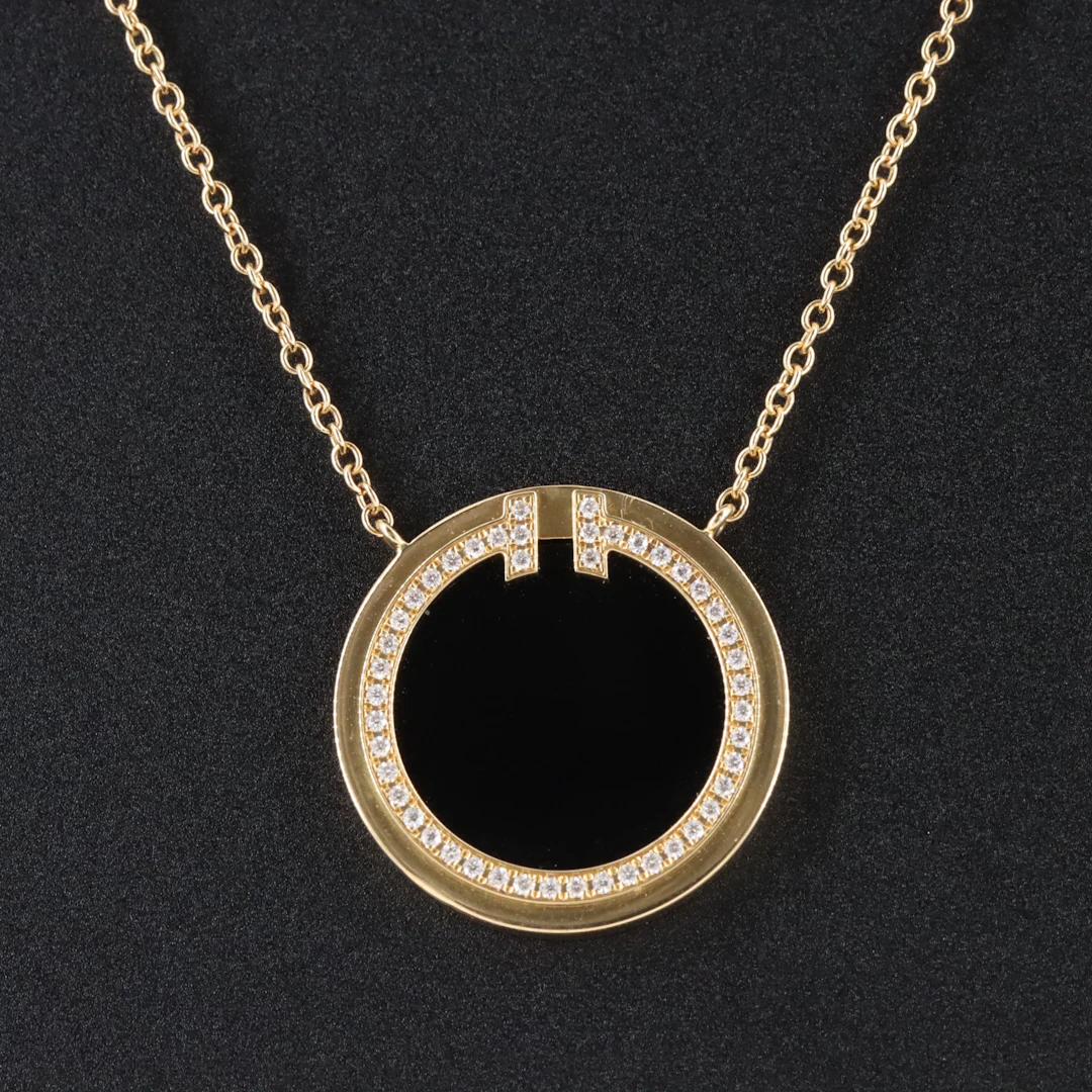 Tiffany & Co. T 18K Black Onyx and Diamond Circle Pendant Necklace
