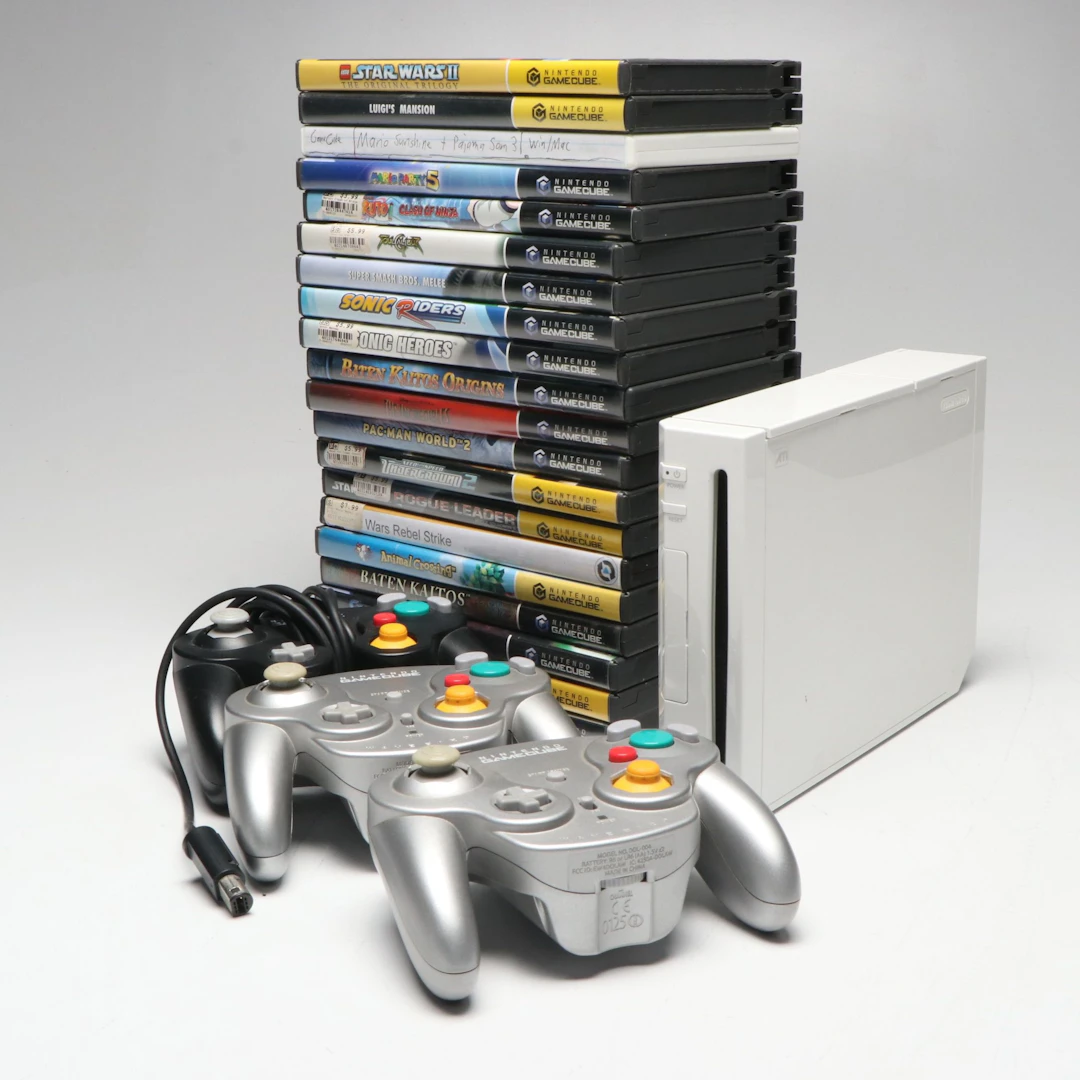 Nintendo Wii with GameCube Controllers and Video Games