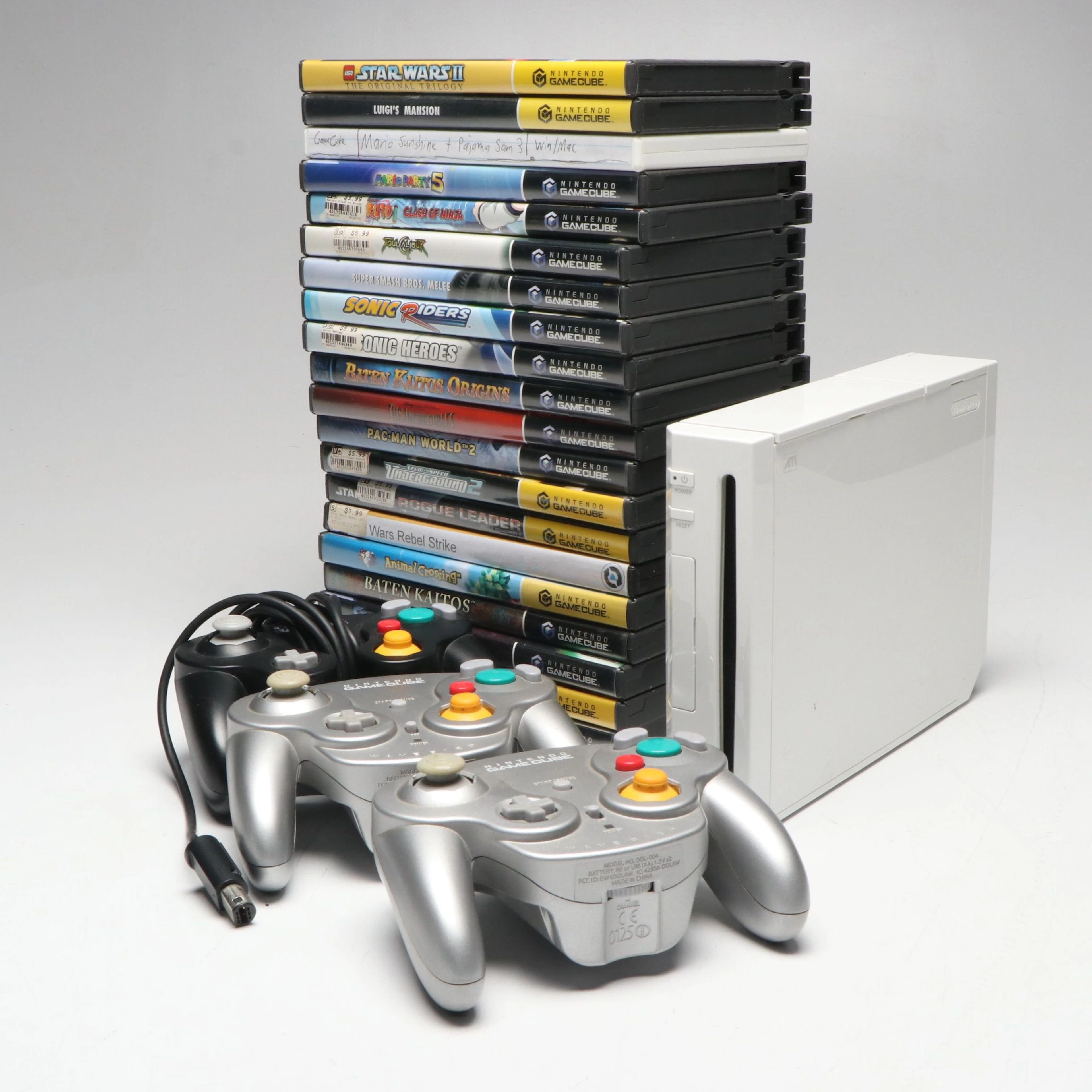 Nintendo Wii with GameCube Controllers and Video Games