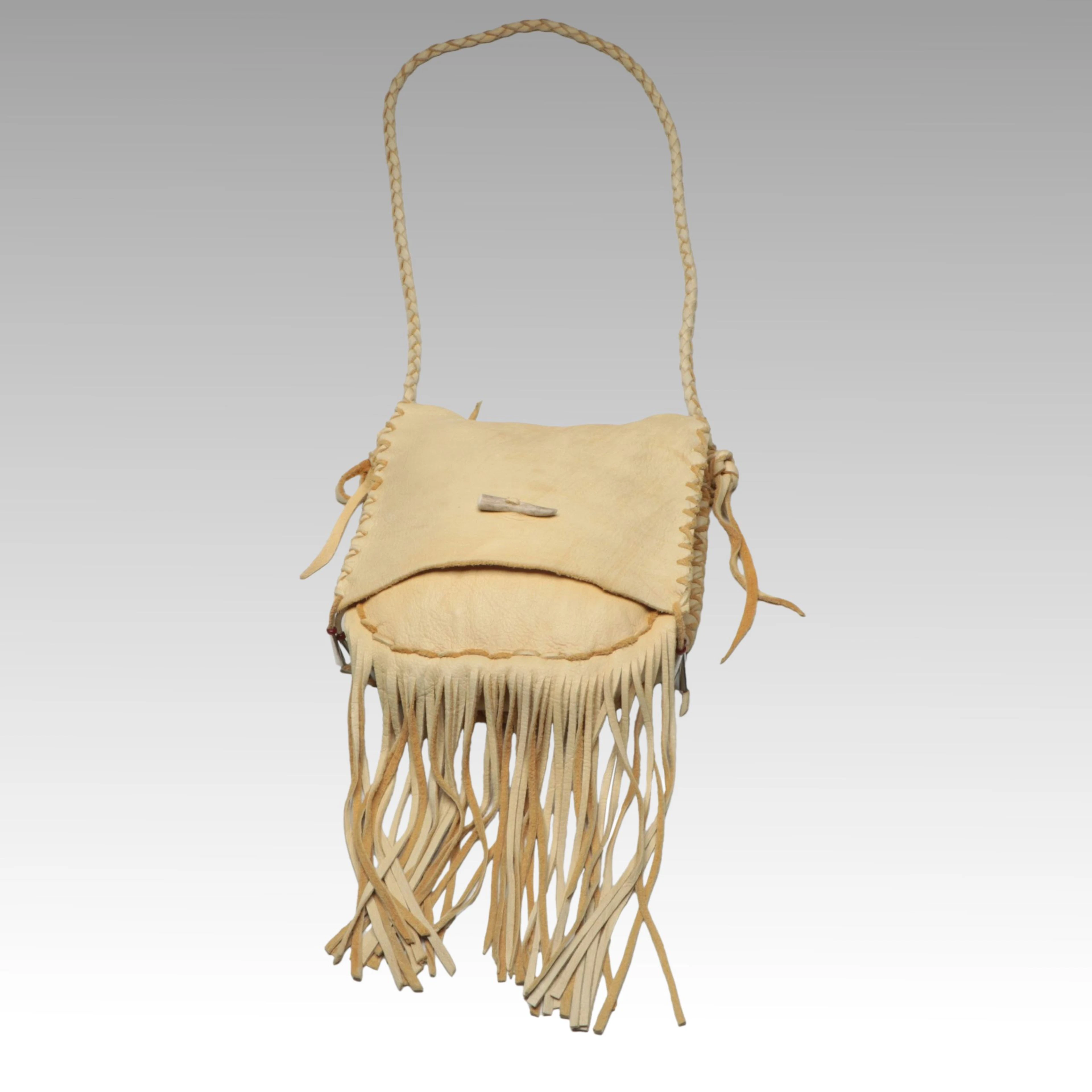 Handcrafted Native American Style Fringed Hide Pouch with Antler Clasp