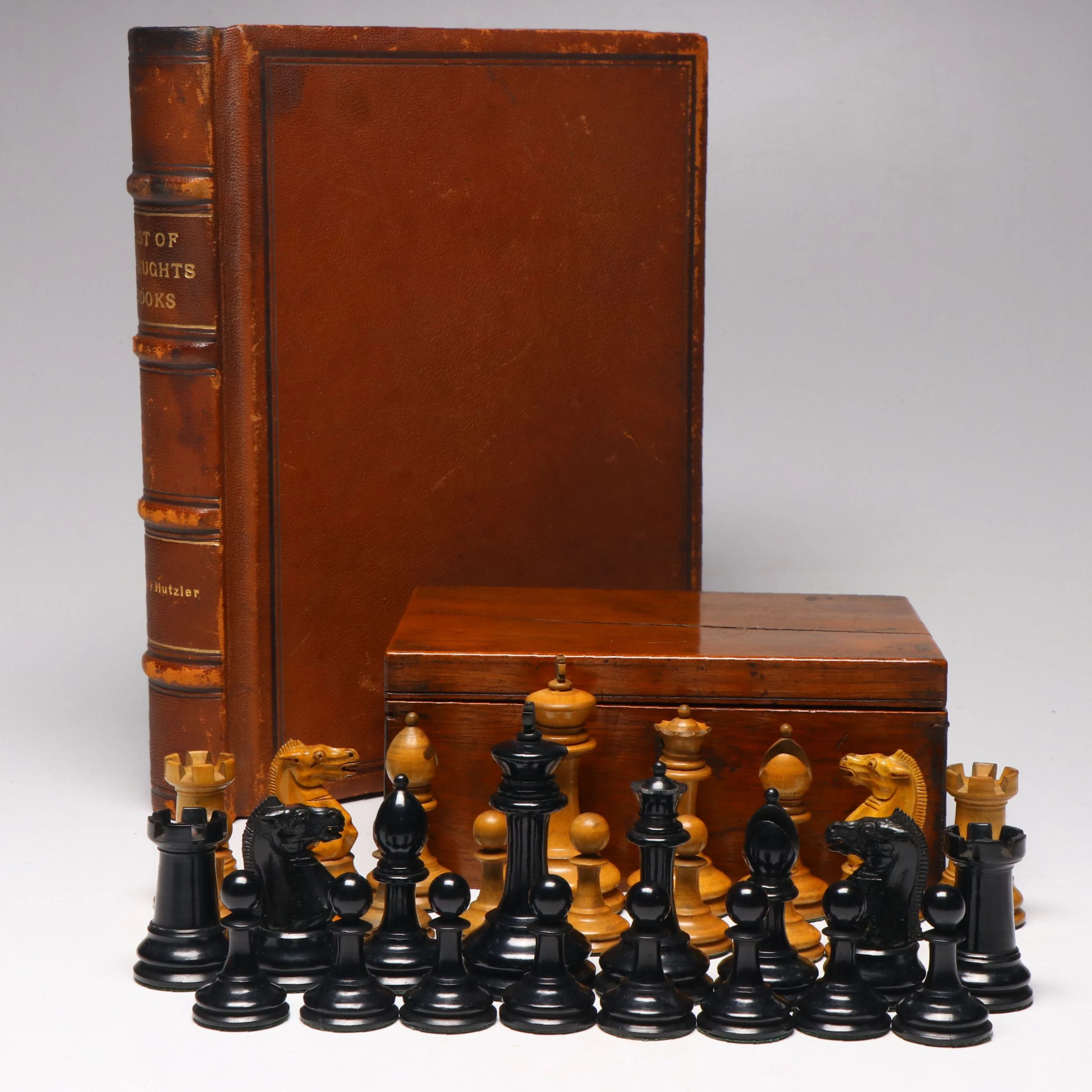 Wooden Chess Pieces with Storage Box and "List of Draughts Books" Book
