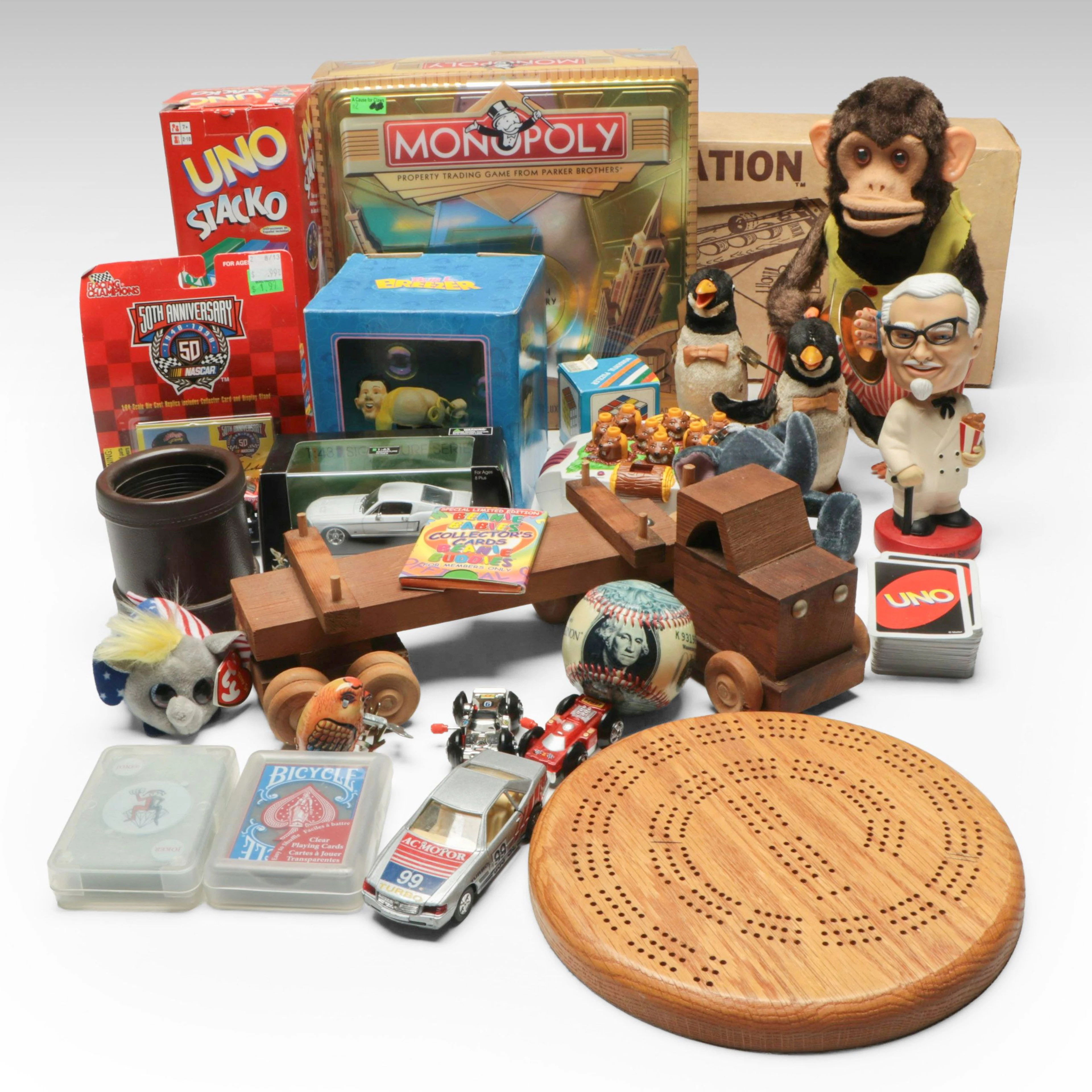 "Monopoly," "Uno Stacko," "Jolly Chimp," and More Vintage Toys and Games