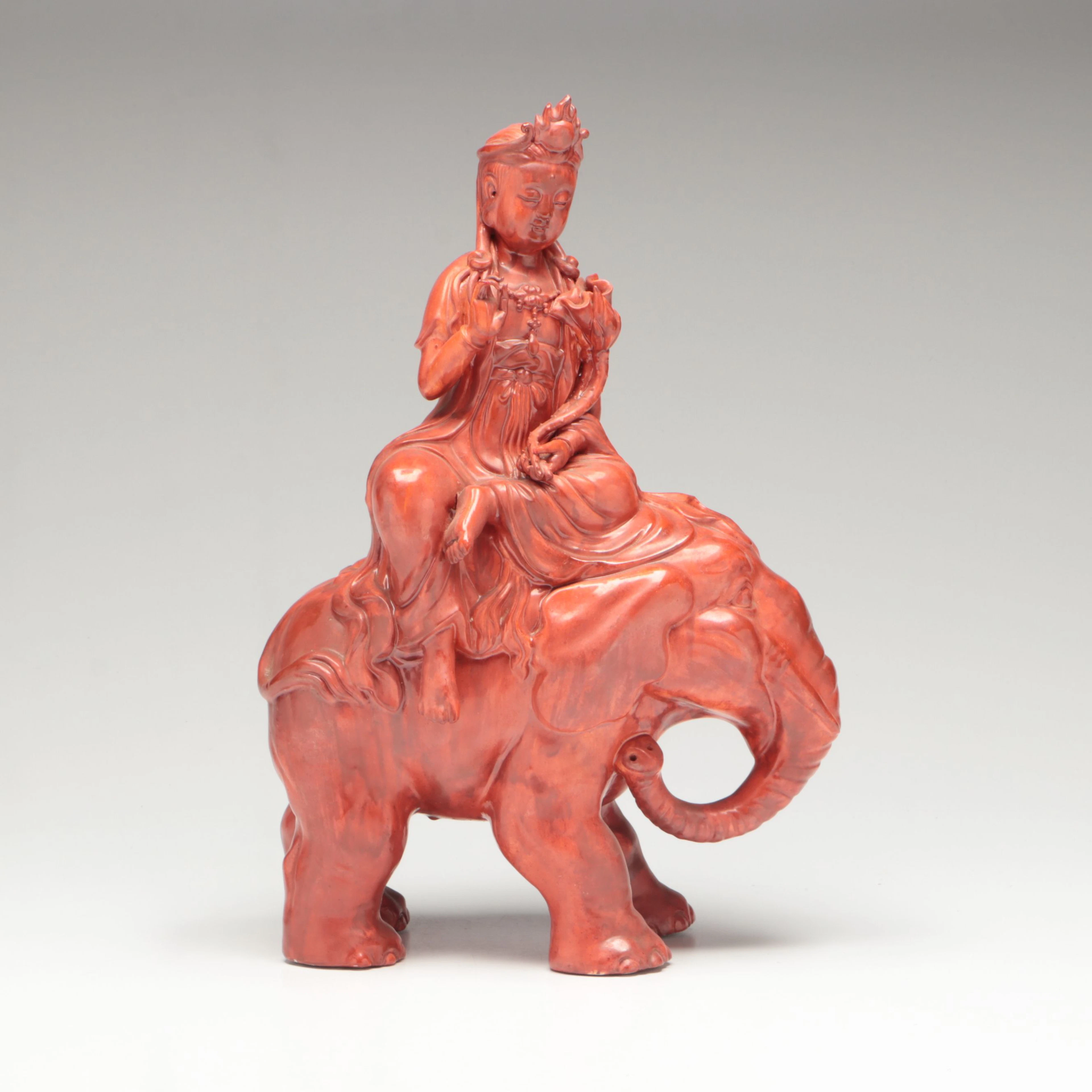 Guanyin Riding Elephant Red Glazed Porcelain Figure