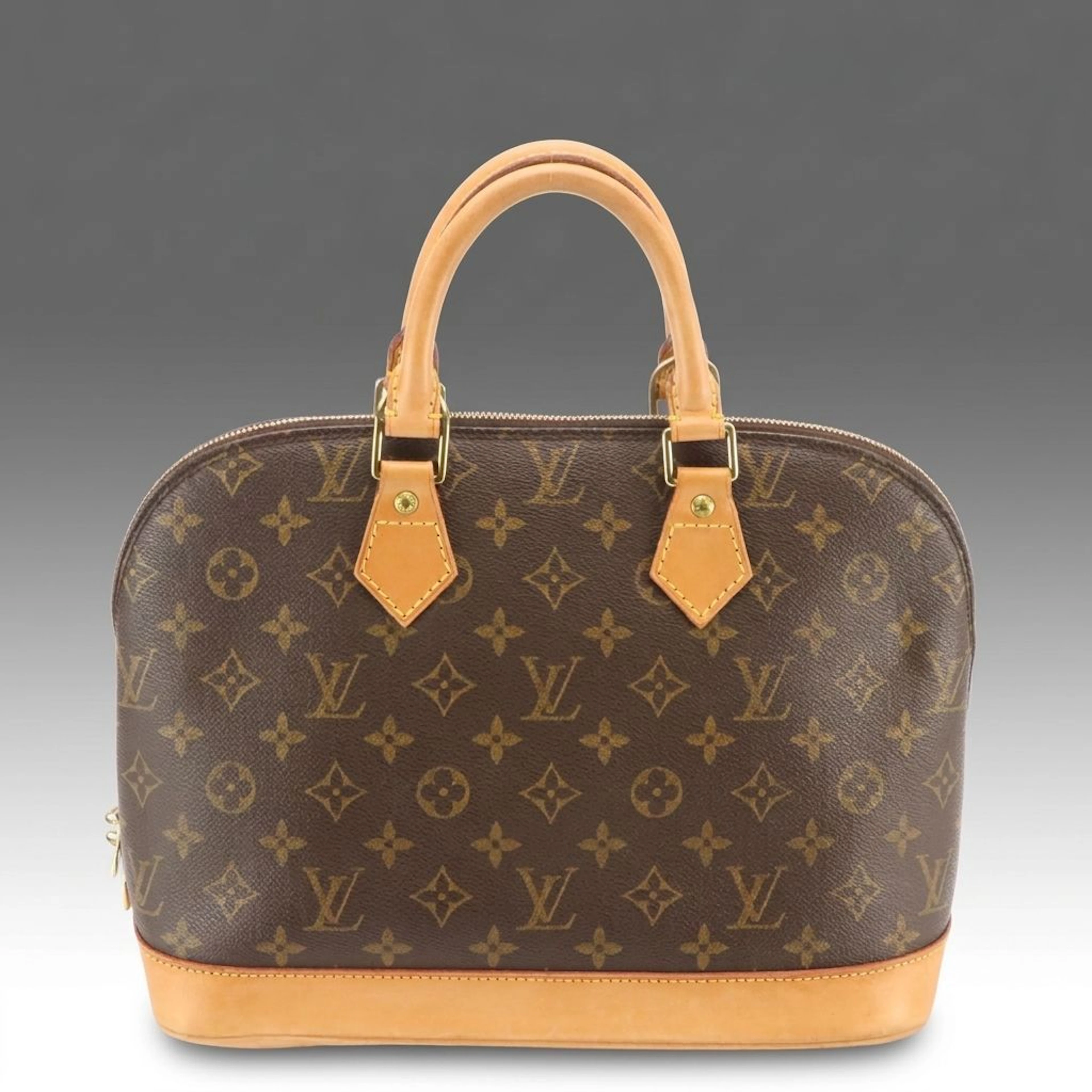 Louis Vuitton Alma PM Handbag in Monogram Canvas and Leather