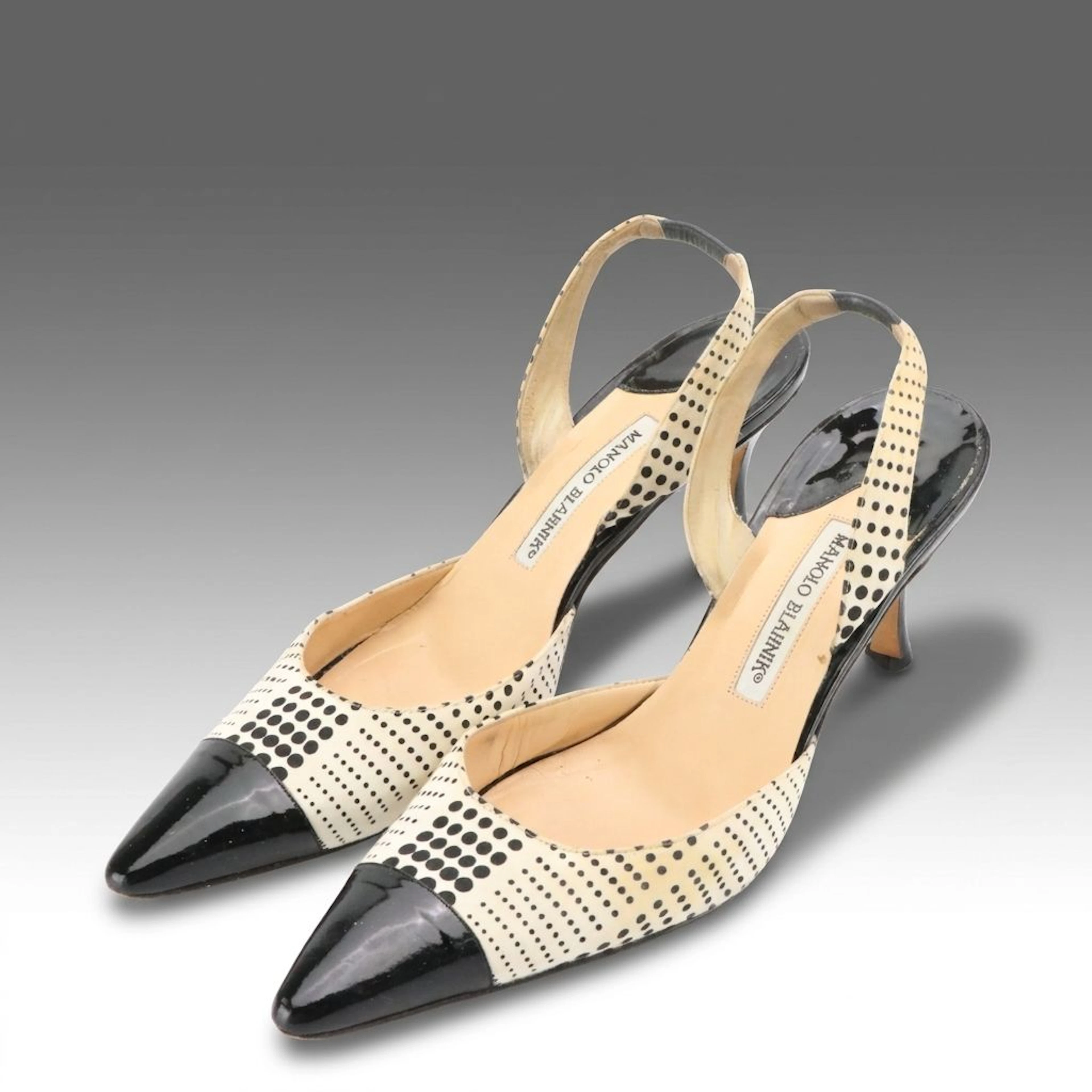 Manolo Blahnik Dotted and Black Patent Leather Cap-Toe Slingback Pumps