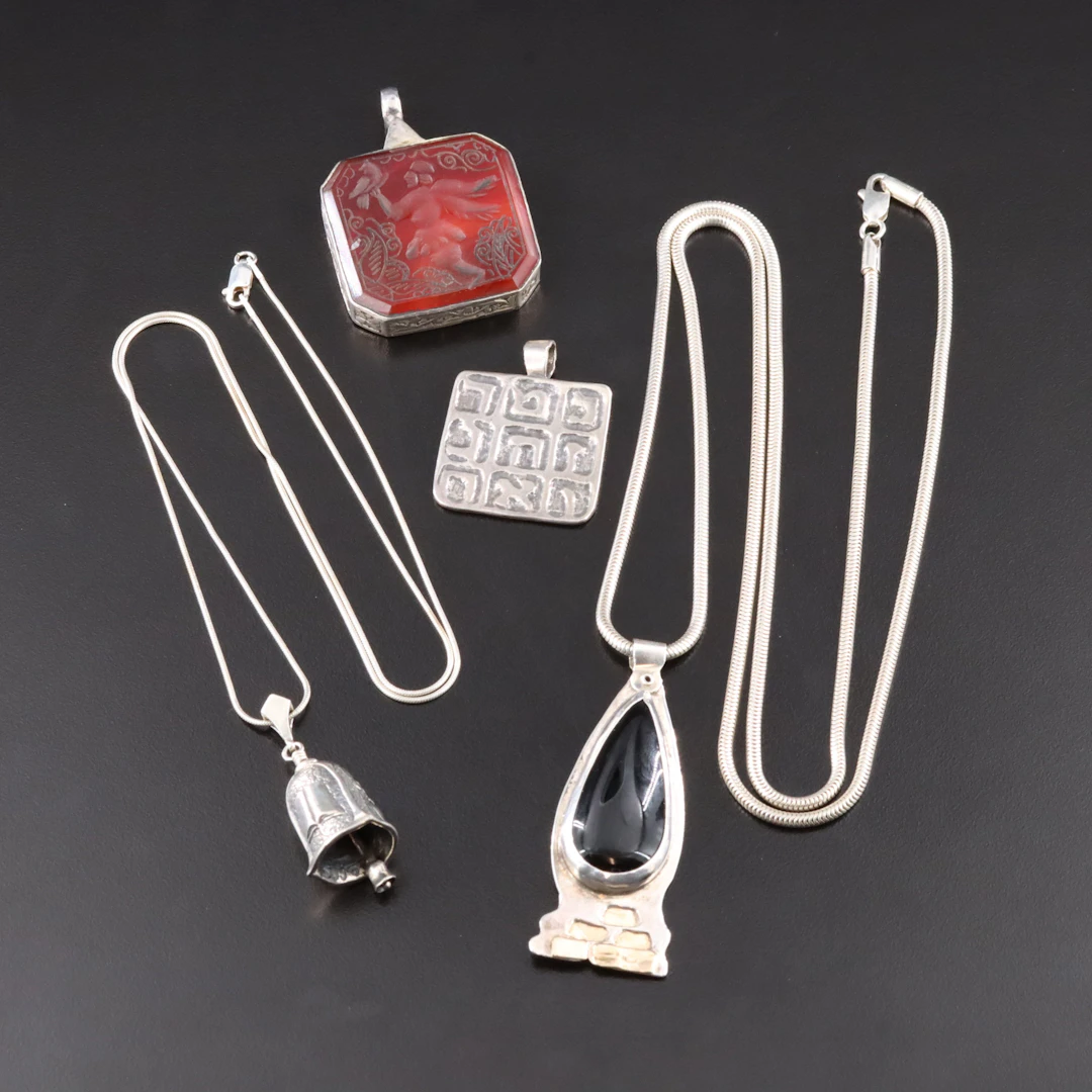 Carnelian Intaglio and Black Onyx Featured in Sterling Pendants and Necklaces