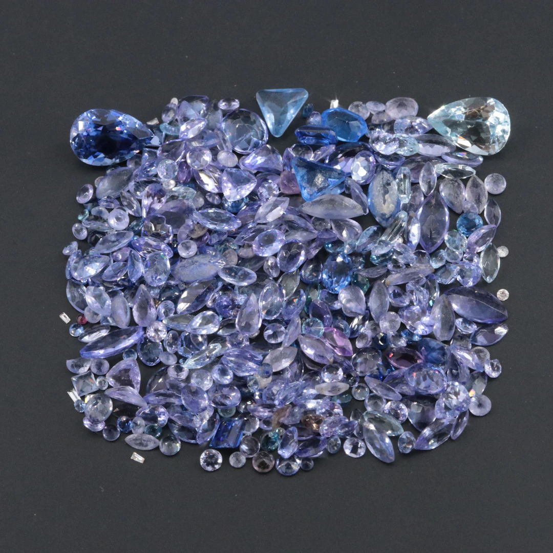 Loose 51.08 CTW Gemstone Lot Including Aquamarine and Tanzanite
