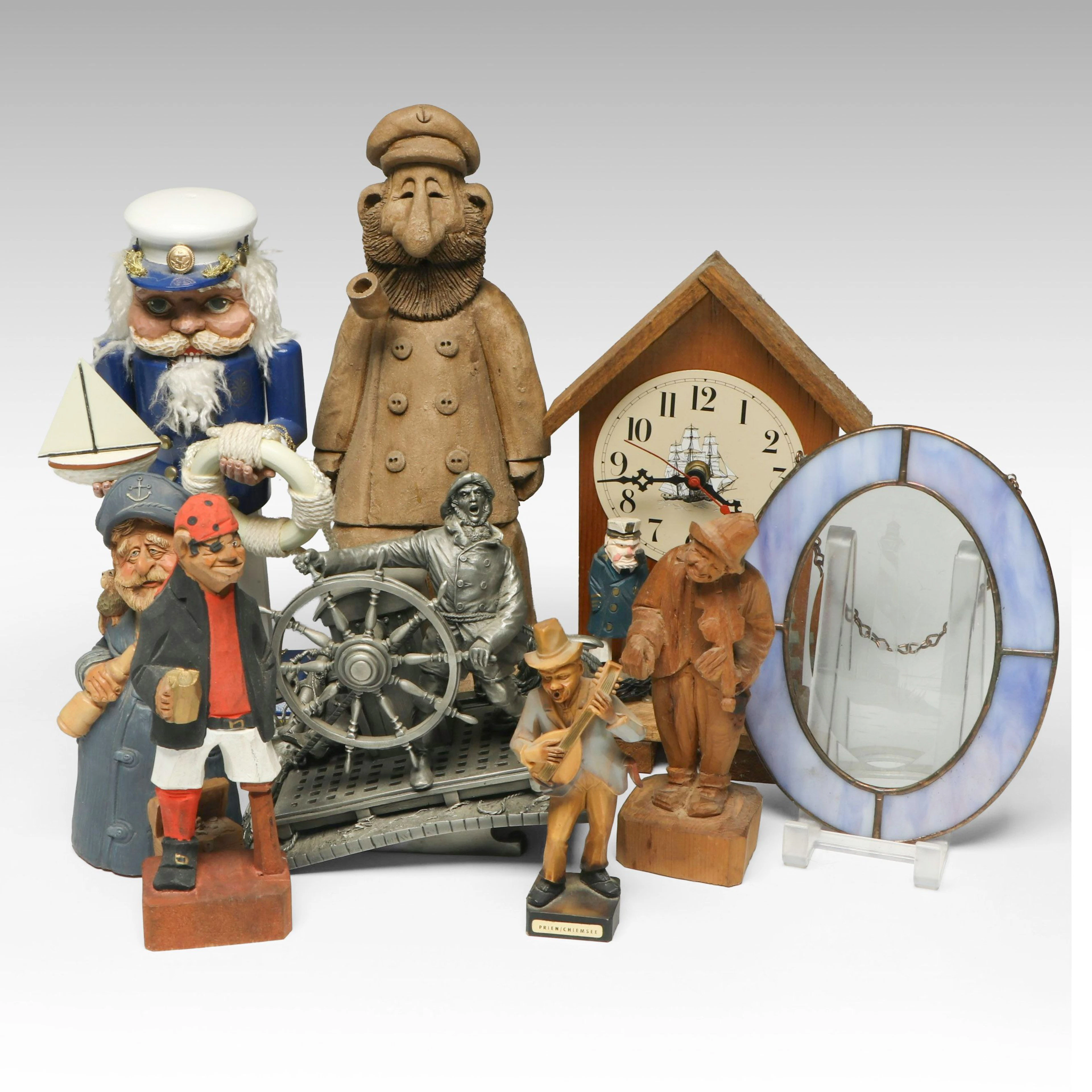 Artist Signed Pottery Sailor with Other Nautical Figurines, Clock and More
