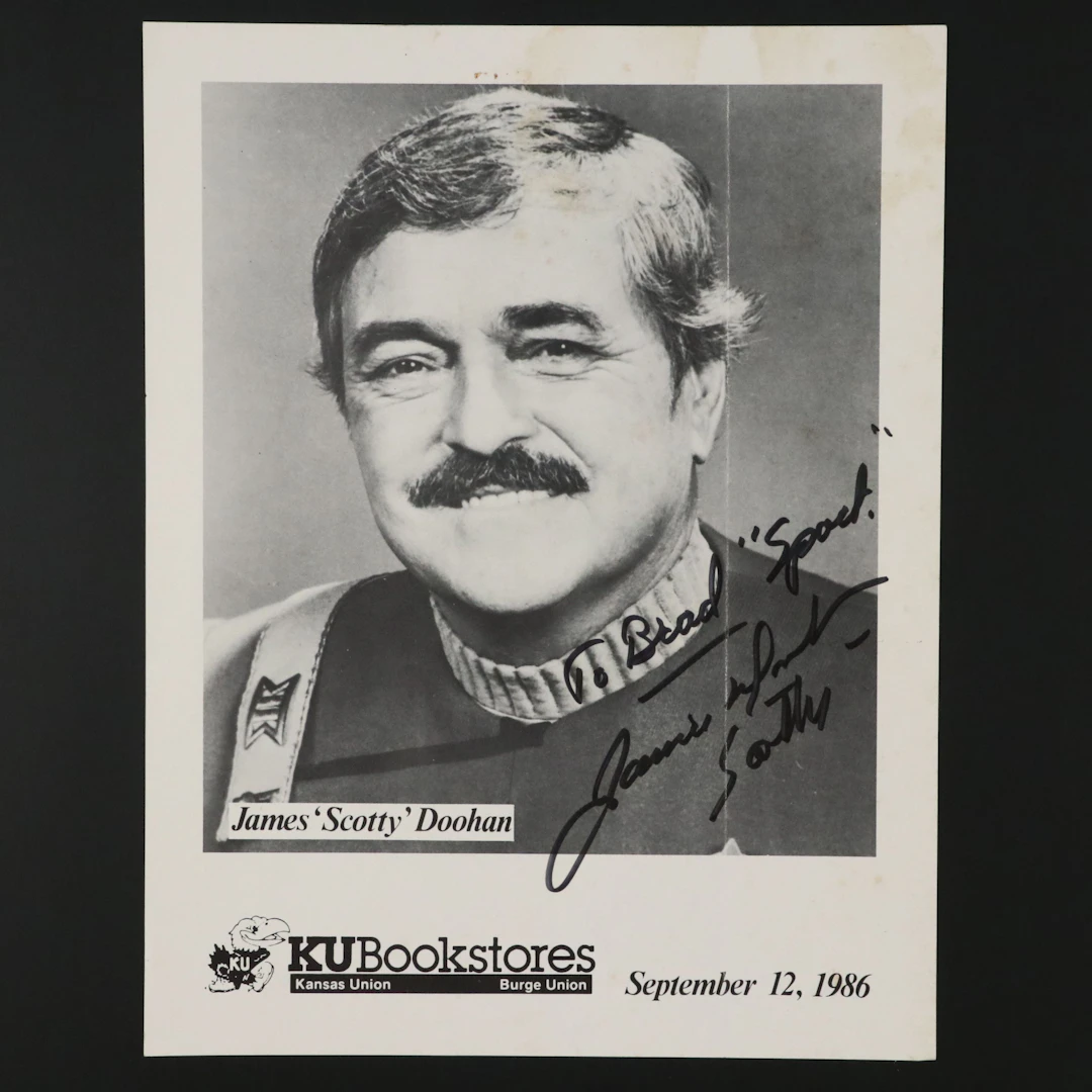 James "Scotty" Doohan Signed KU Bookstores Halftone Advertisement, 1986