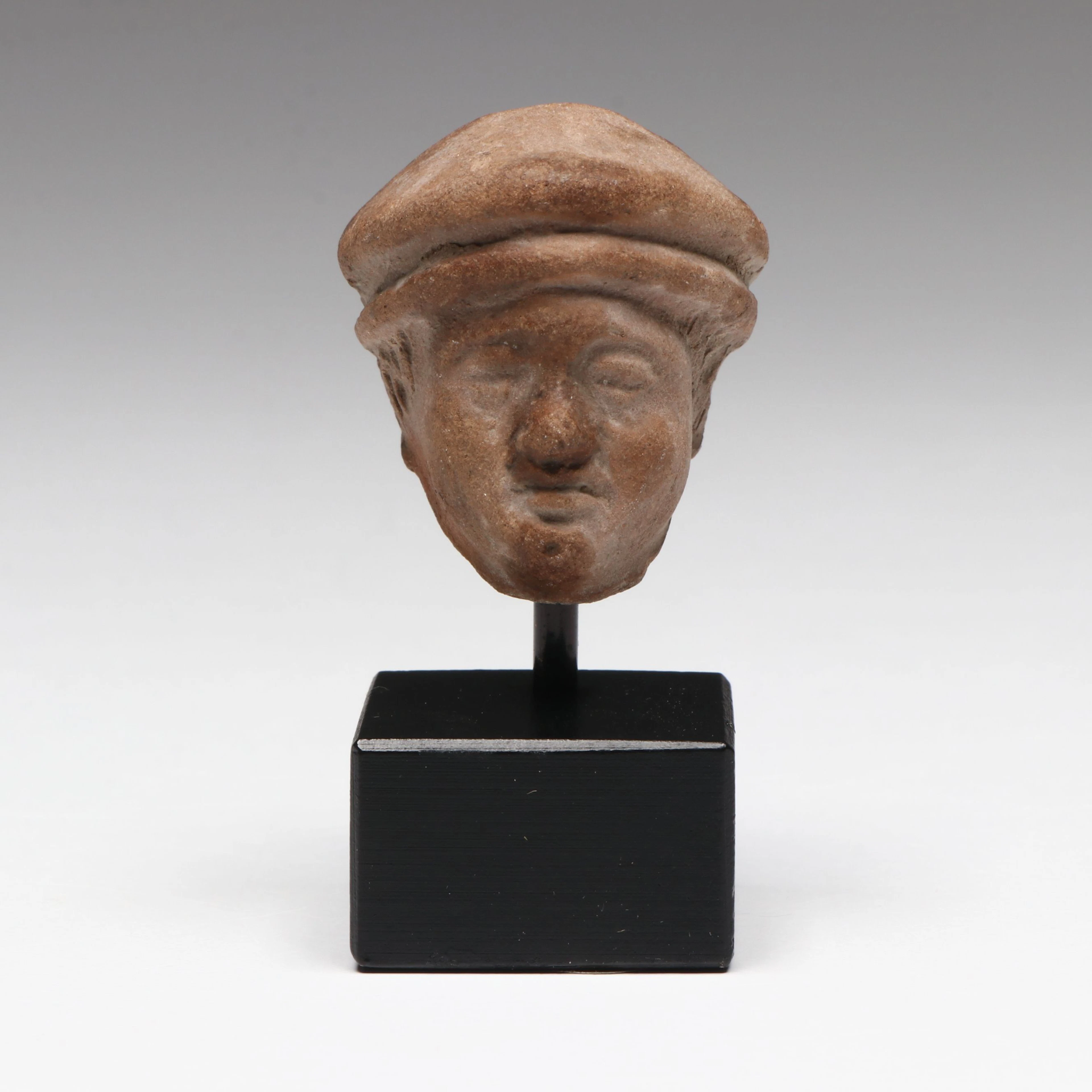 Hellenistic Terracotta Head of Man in Cap