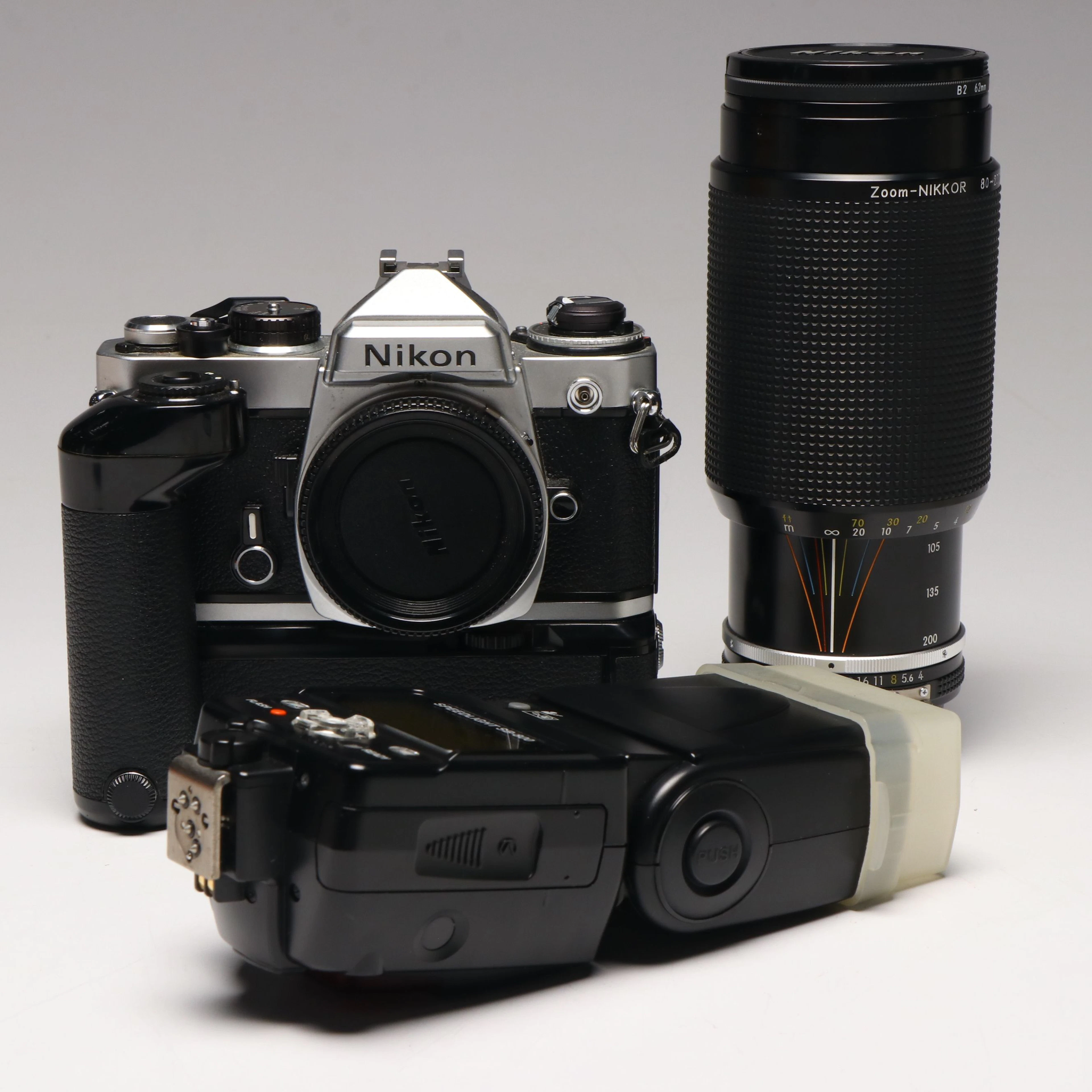Nikon FE Film Camera with MD-12 Motor Drive and More Camera Accessories