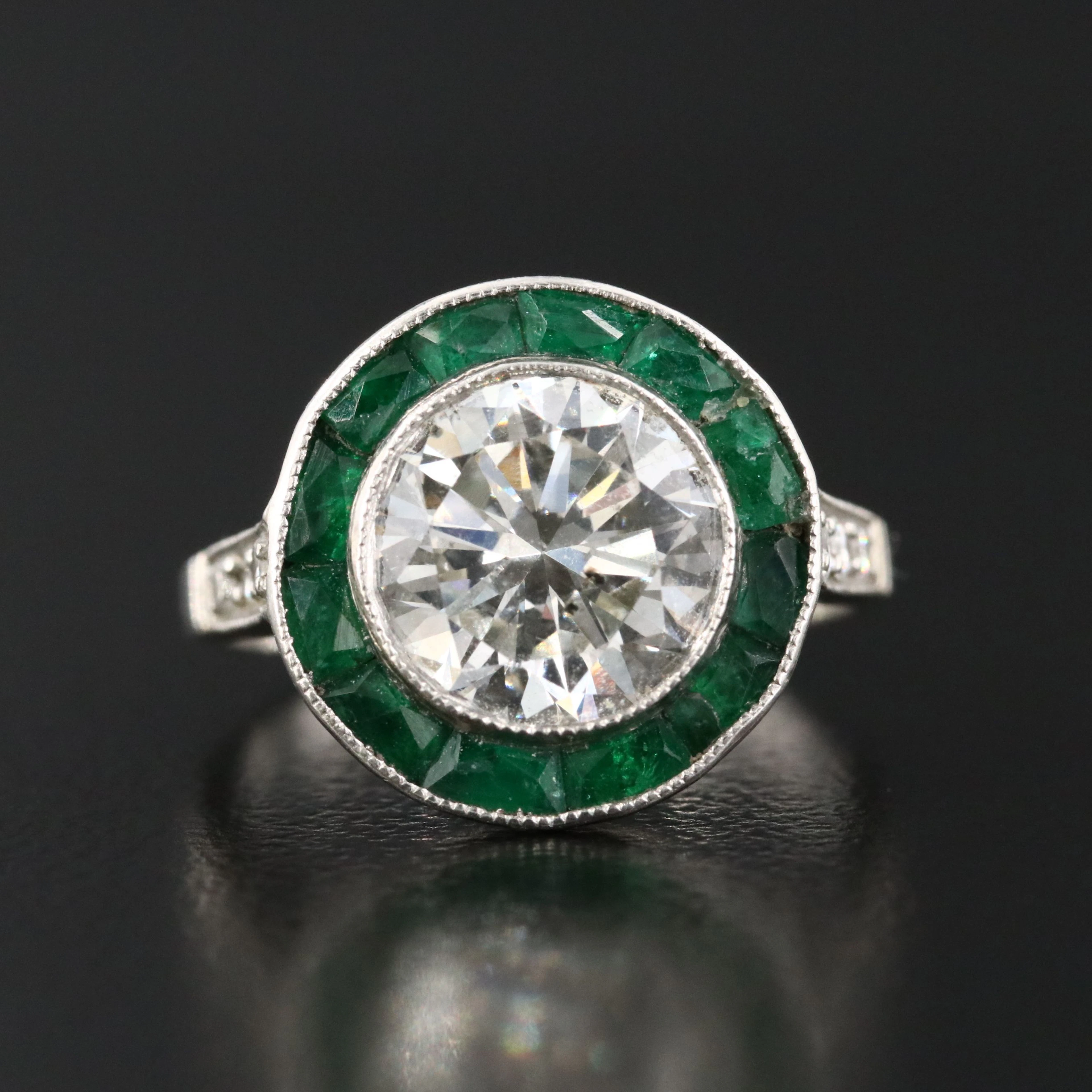 Art Deco Platinum 2.10 CT Diamond and Emerald Halo Ring