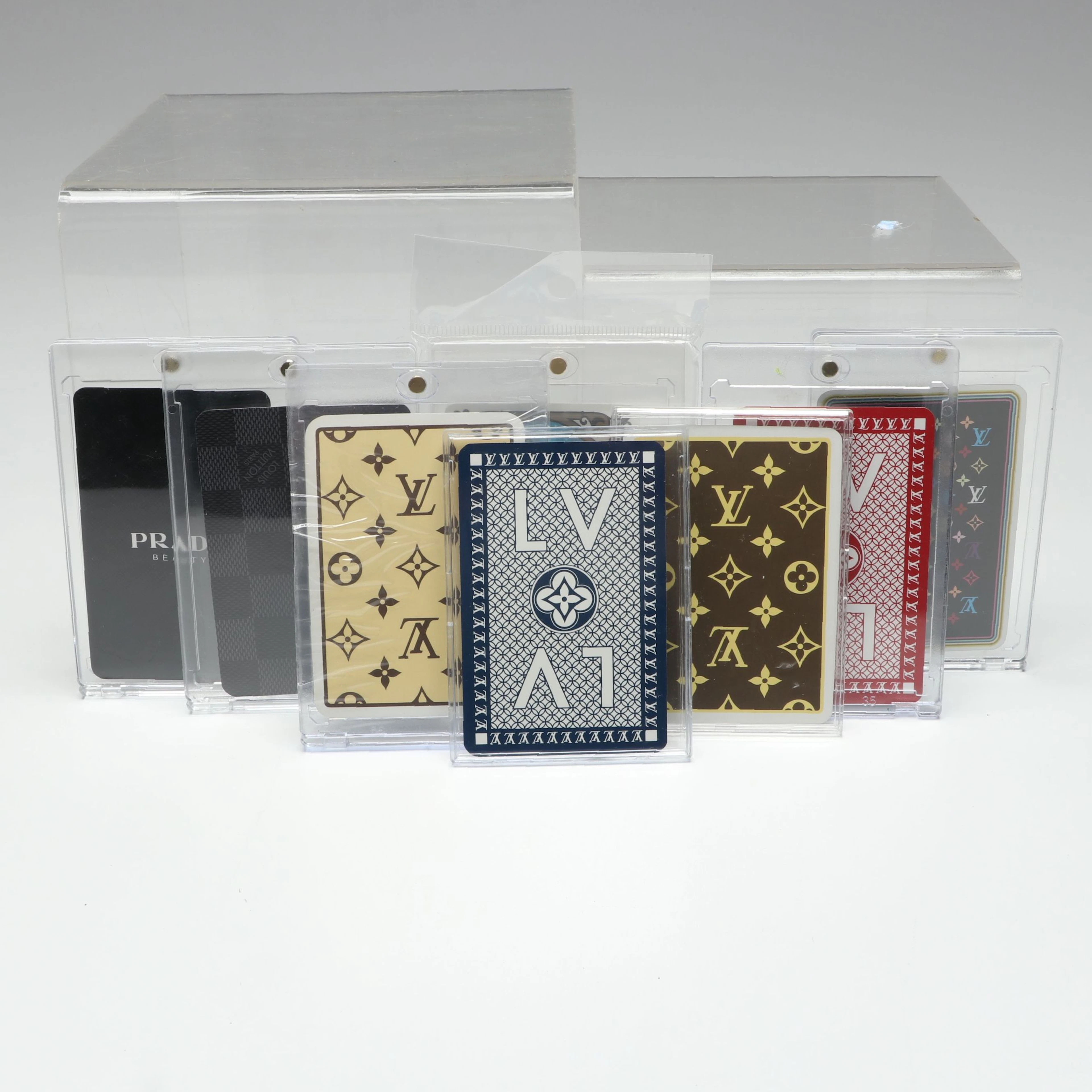 Designer Collectible Playing Cards in Cases Featuring Prada and Louis Vuitton