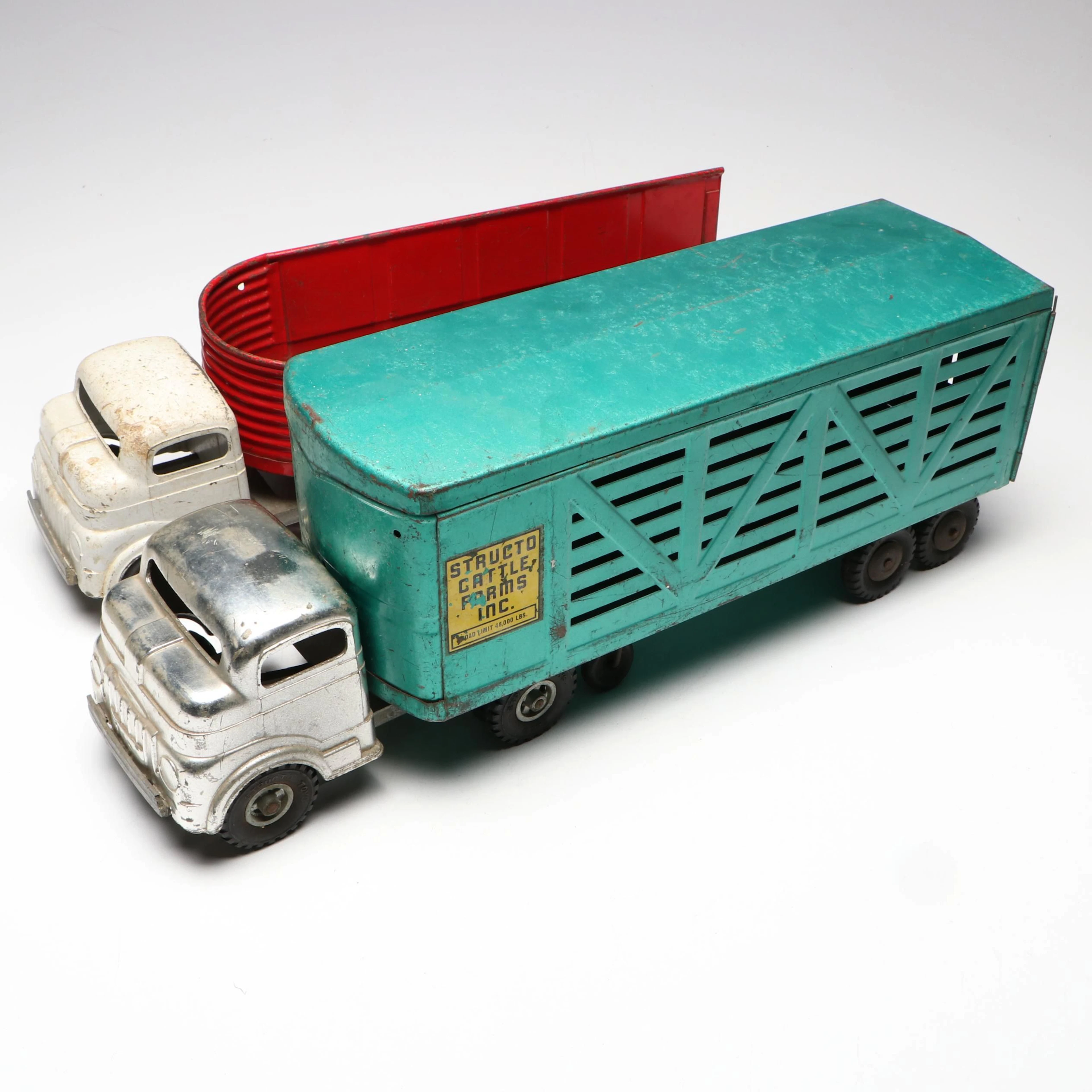 Structo Cattle Farms and Steel Company Pressed Steel Toy Trucks, Mid-20th C.