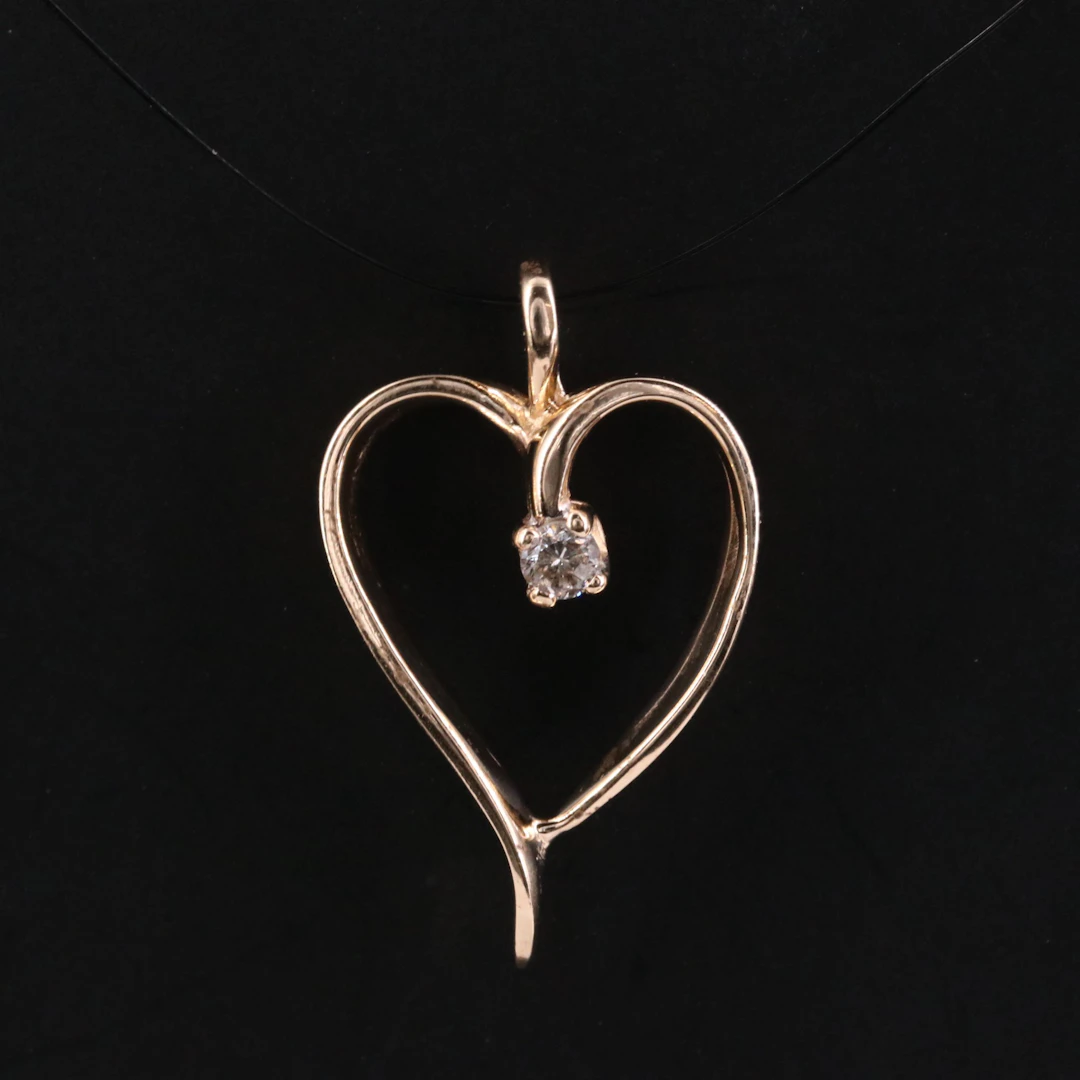 14K 0.06 CT Diamond Heart Pendant