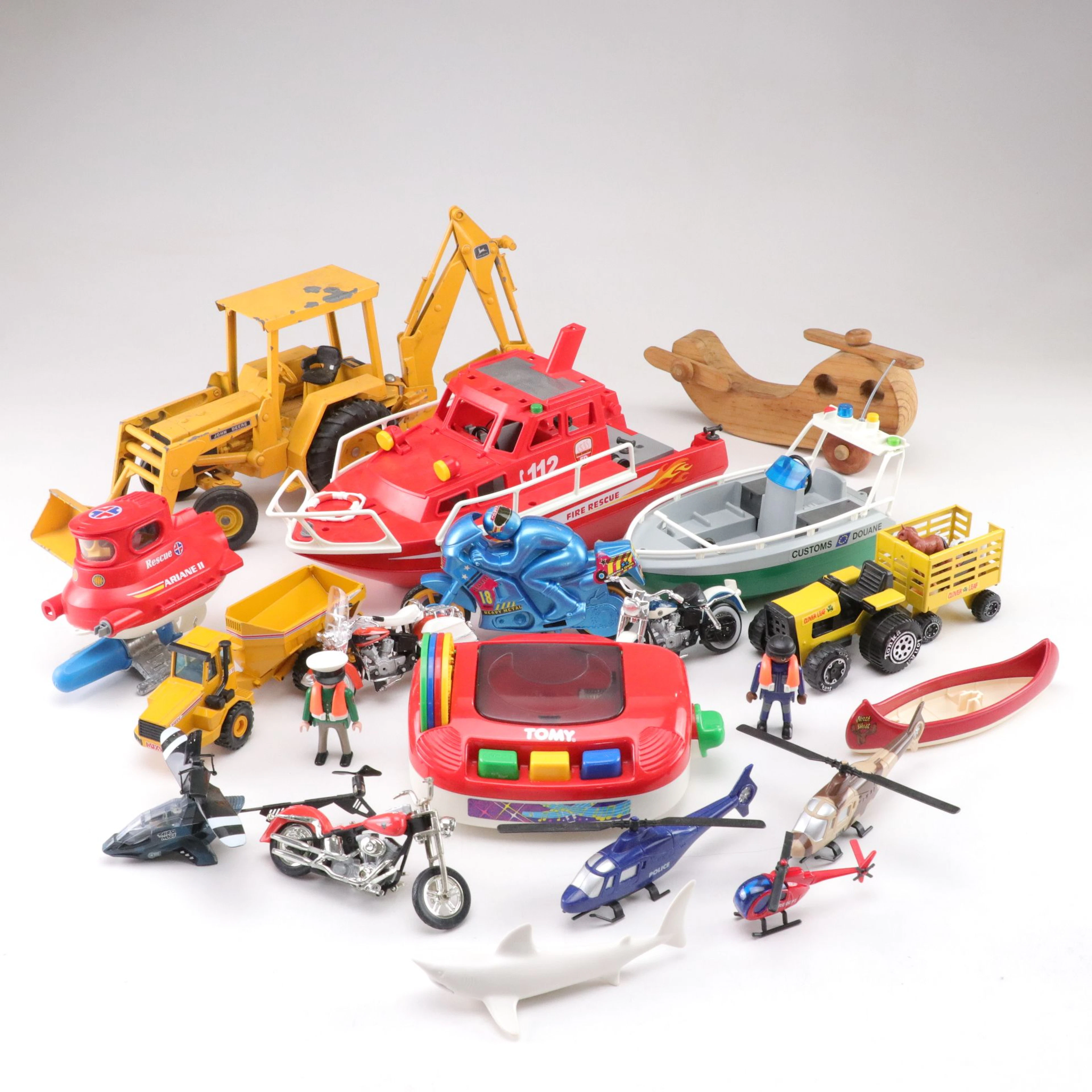 Toy John Deere Backhoe Loader, TOMY Bring Along A Song, & More Toys