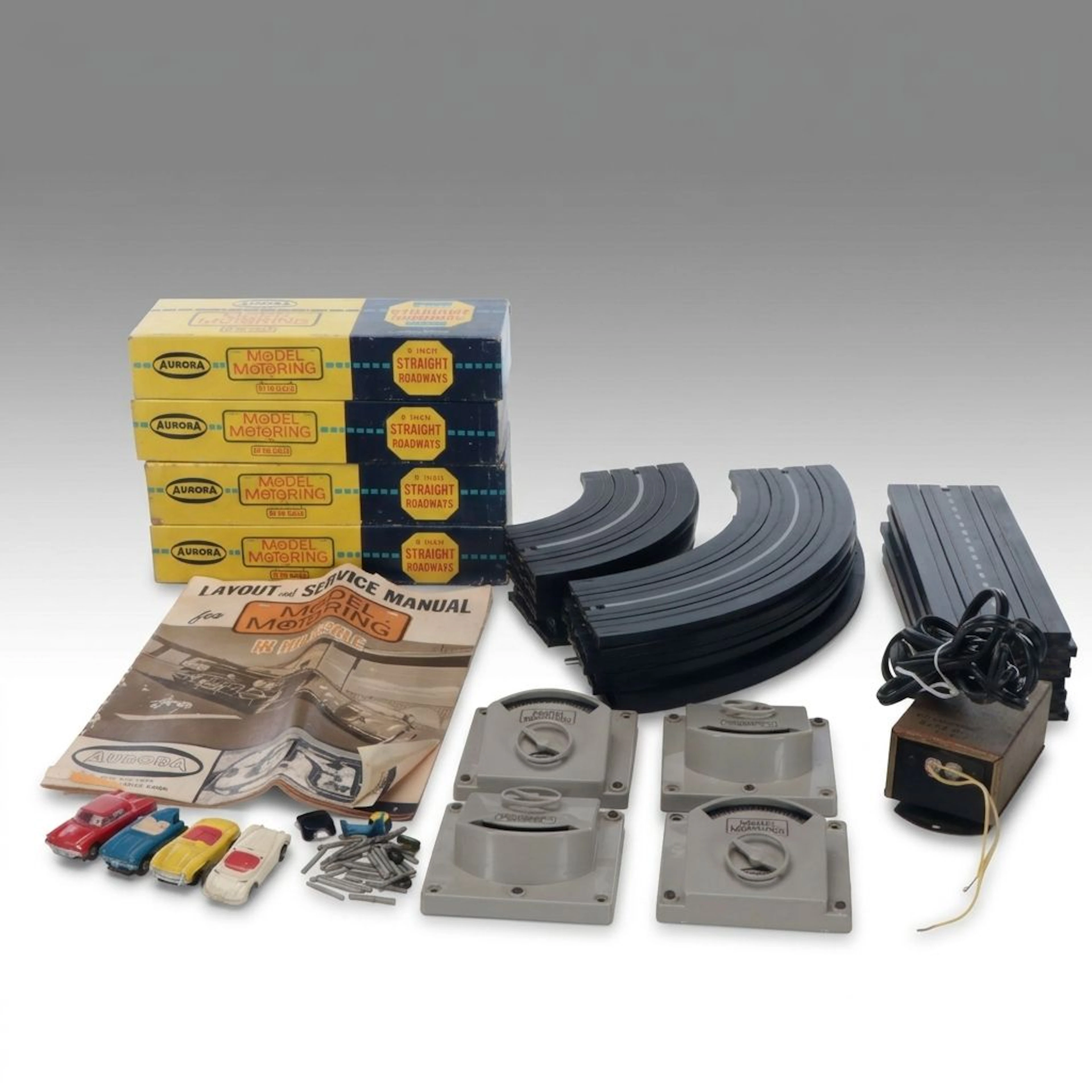 Aurora Model Motoring HO Scale Slot Car Track and Accessories