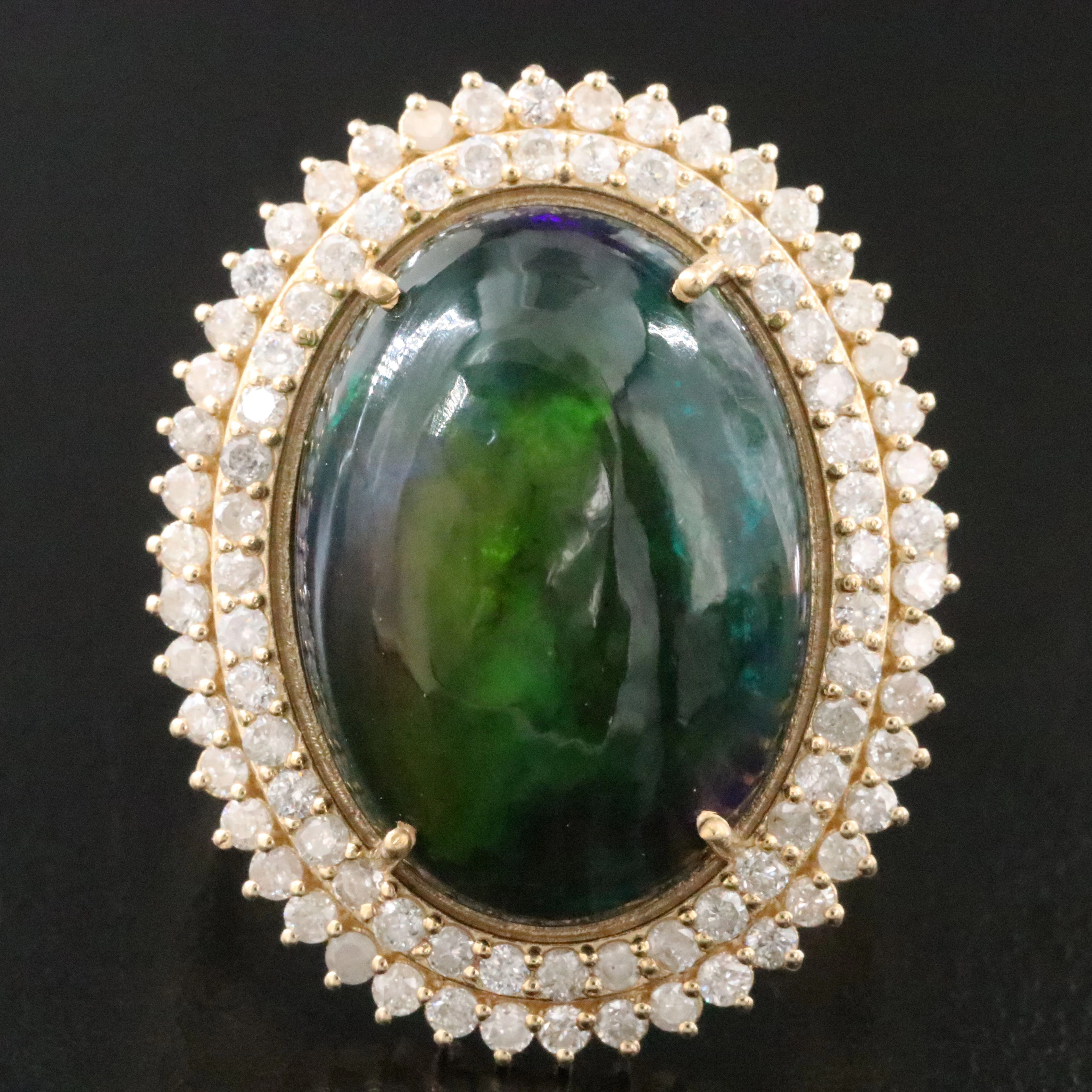 14K 8.77 CT Opal and 1.42 CTW Diamond Ring