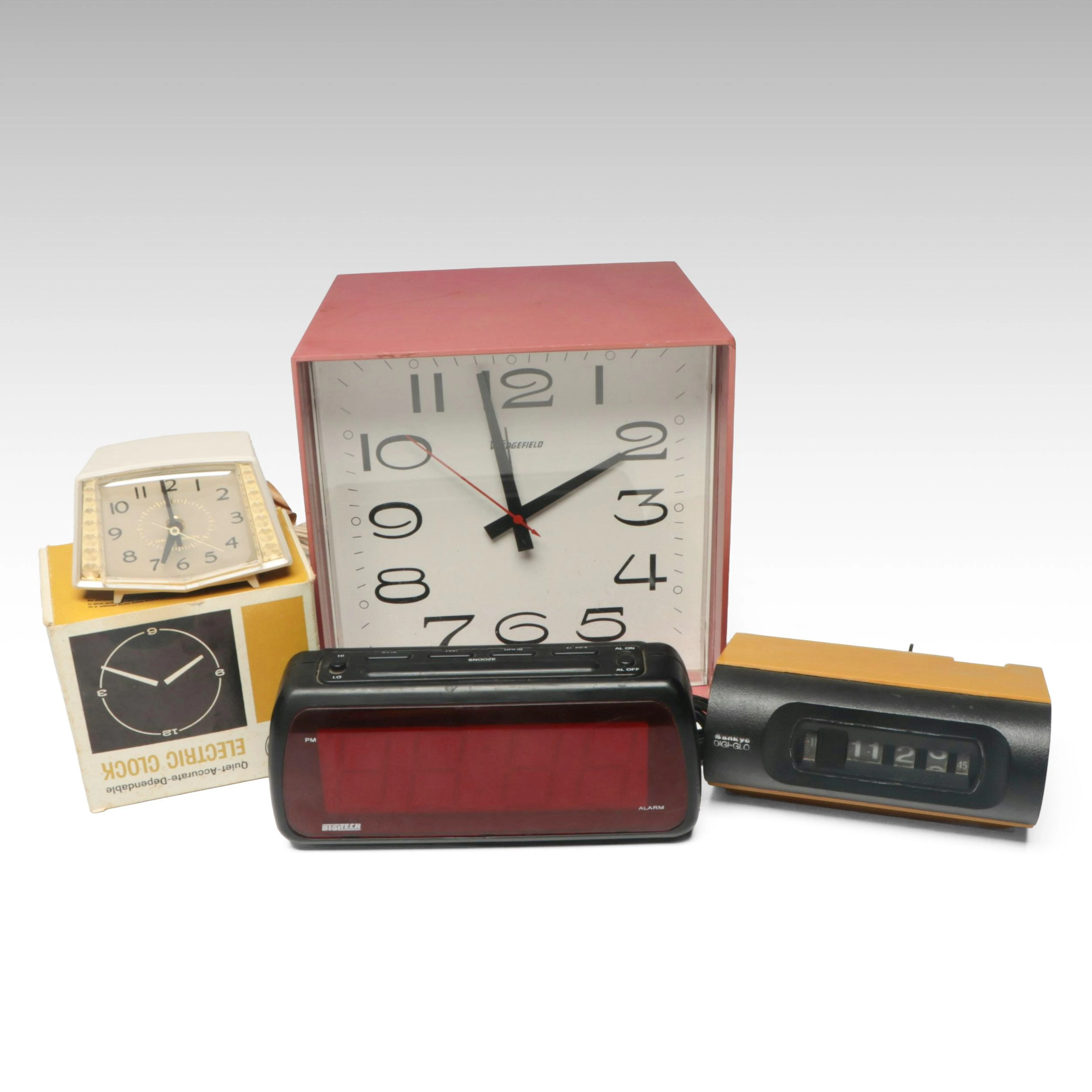 General Electric "Sparkle" in Sandalwood Finish and More Vintage Clocks