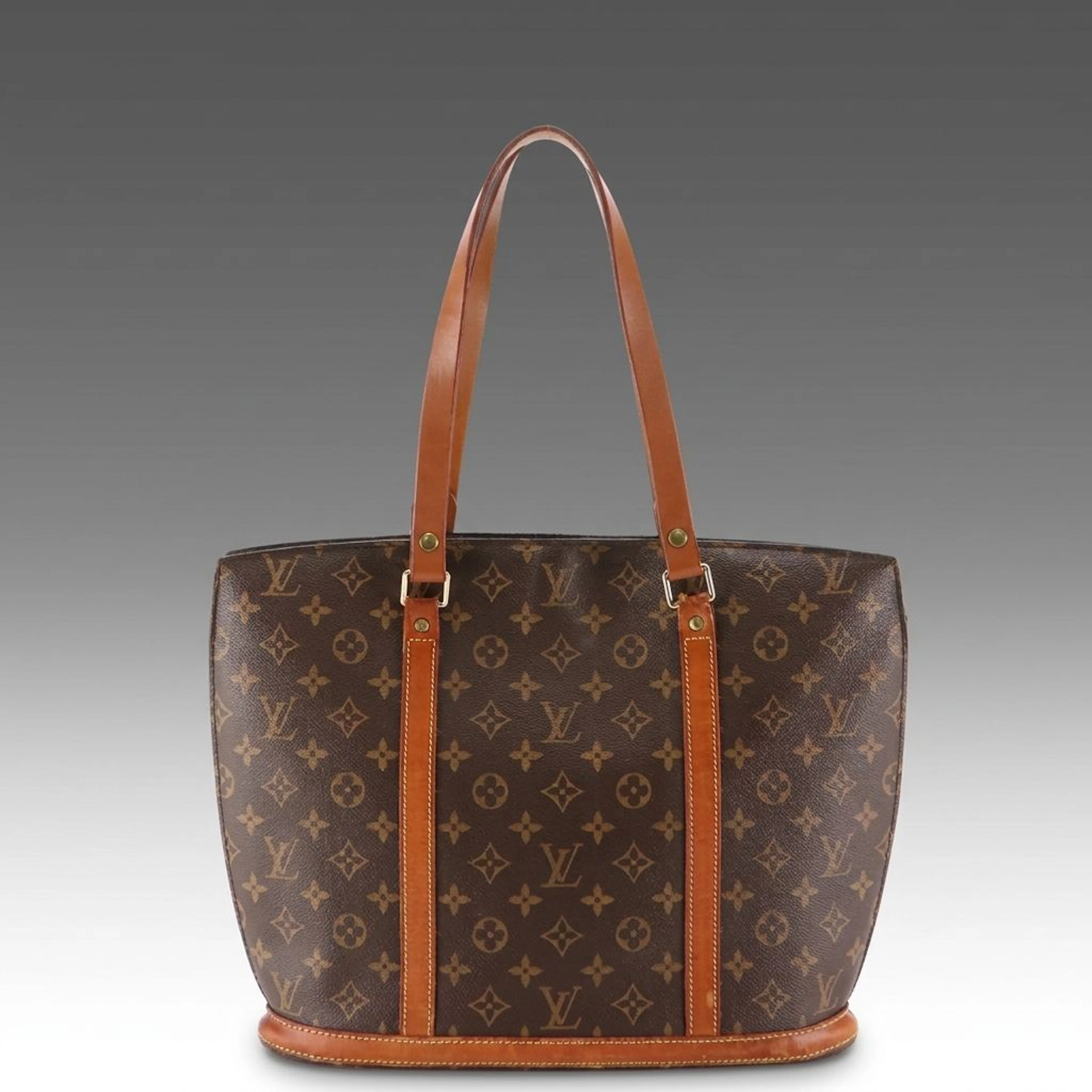 Louis Vuitton Babylone Tote Bag in Monogram Canvas and Vachetta Leather