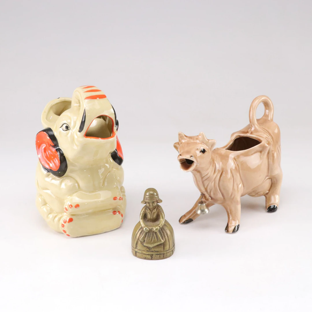 Ceramic Hand-Painted Japanese Elephant and Cow Creamers with Figural Brass Bell