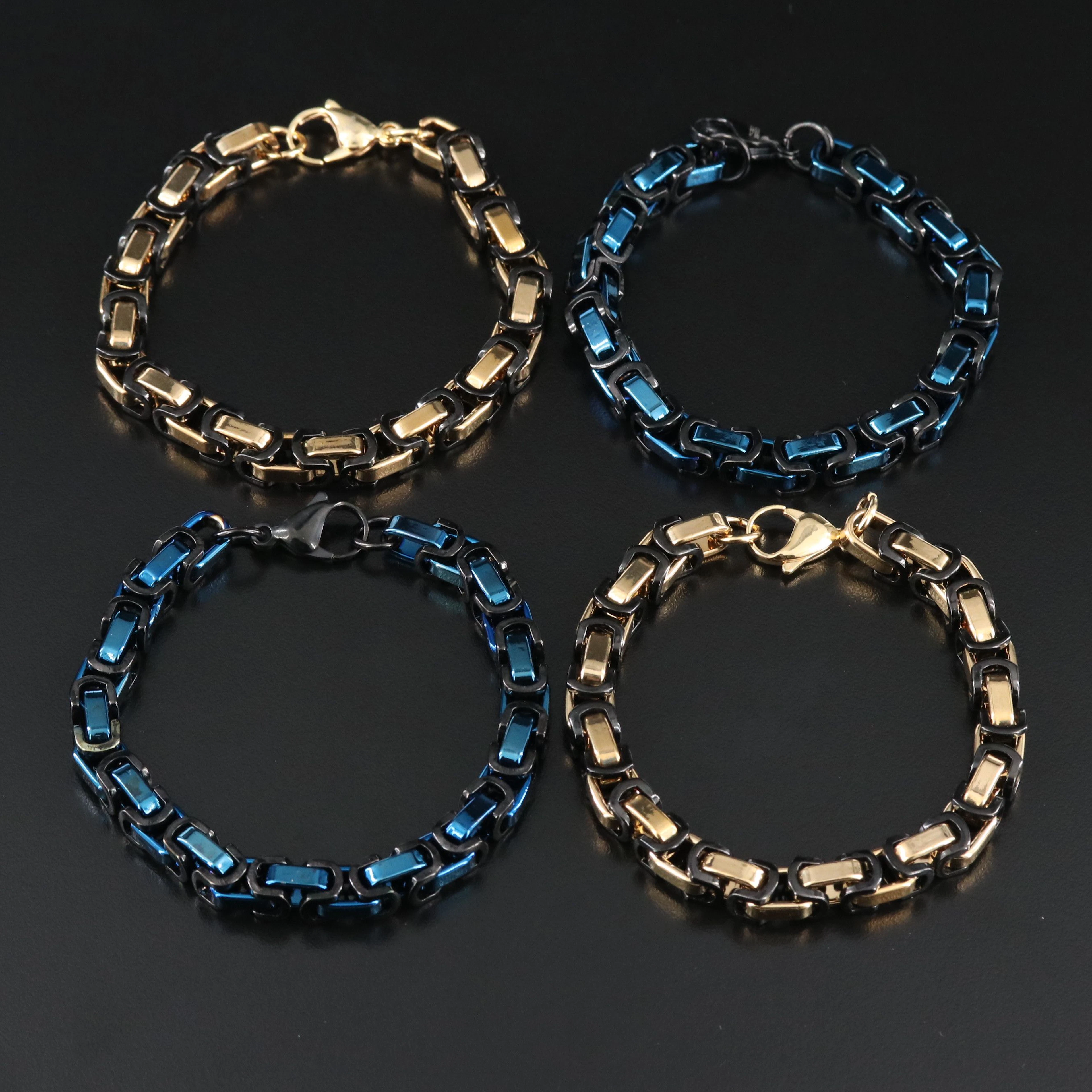 Invicta Blue, Black and Gold Tone Byzantine Link Bracelets