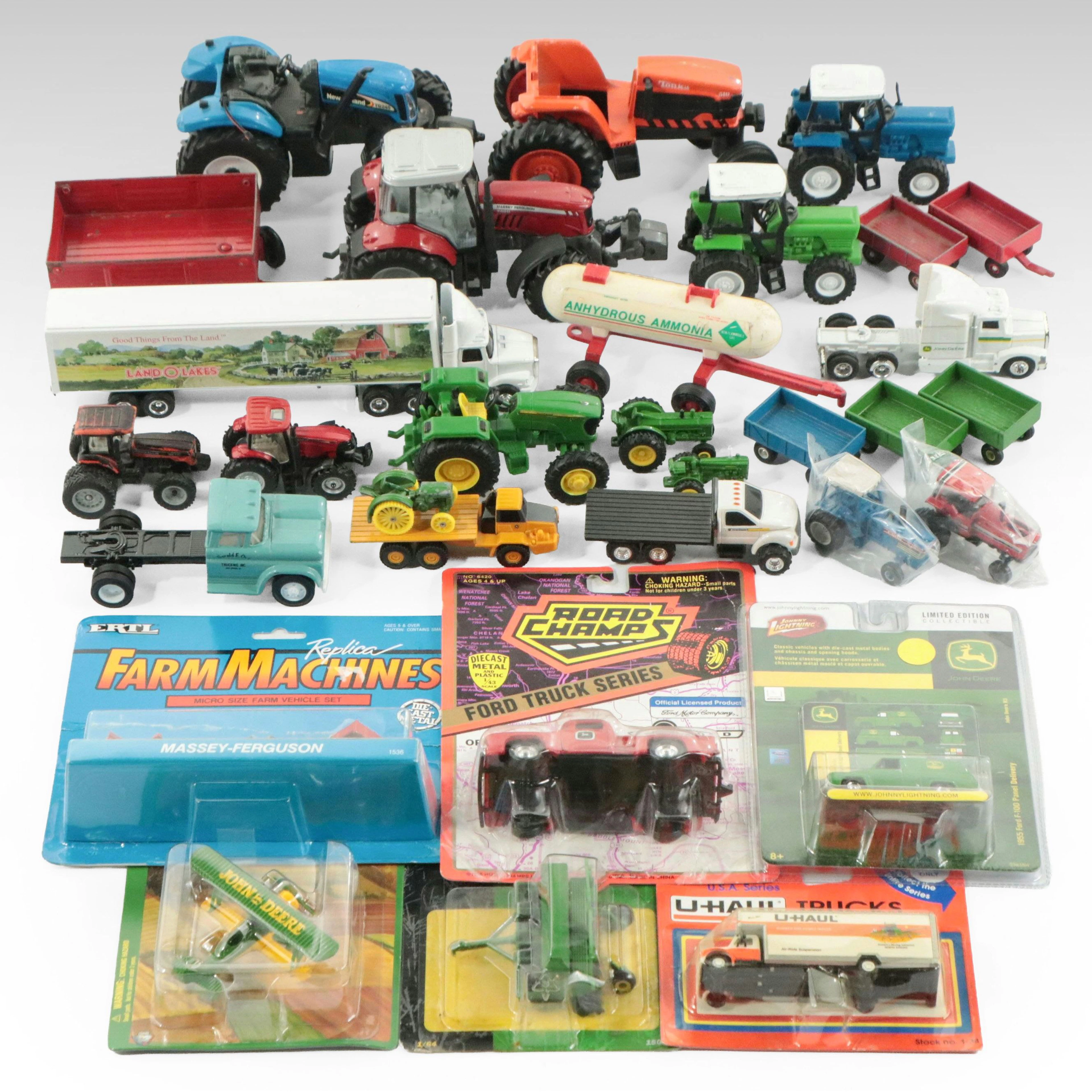 Tonka, Ertl, and More Diecast Vehicles Including John Deere Stearman Biplane