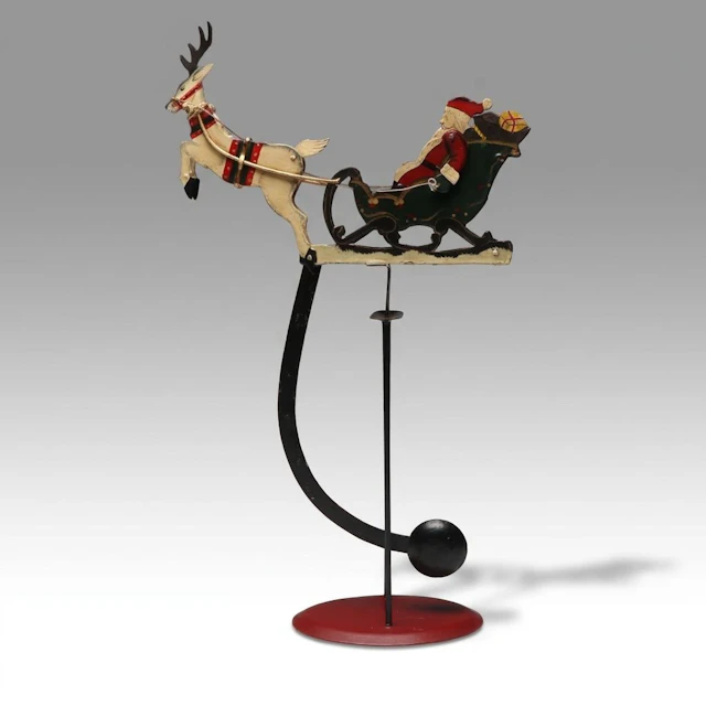 Folk Art Style Painted Metal Santa's Sleigh Kinetic Skyhook Toy