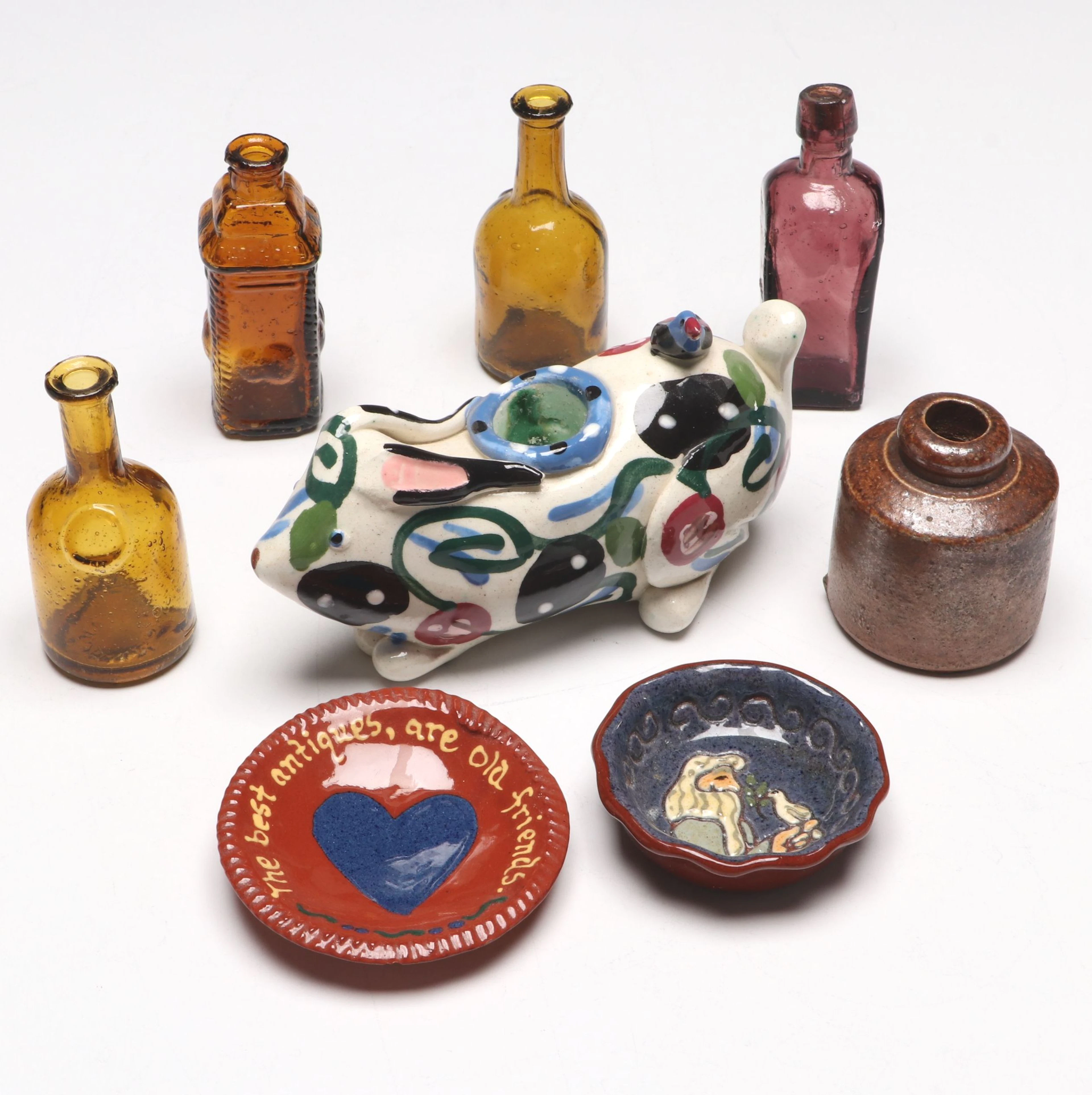Rustic Ceramic Dishes and Vase with Candlestick and Glass Bottles
