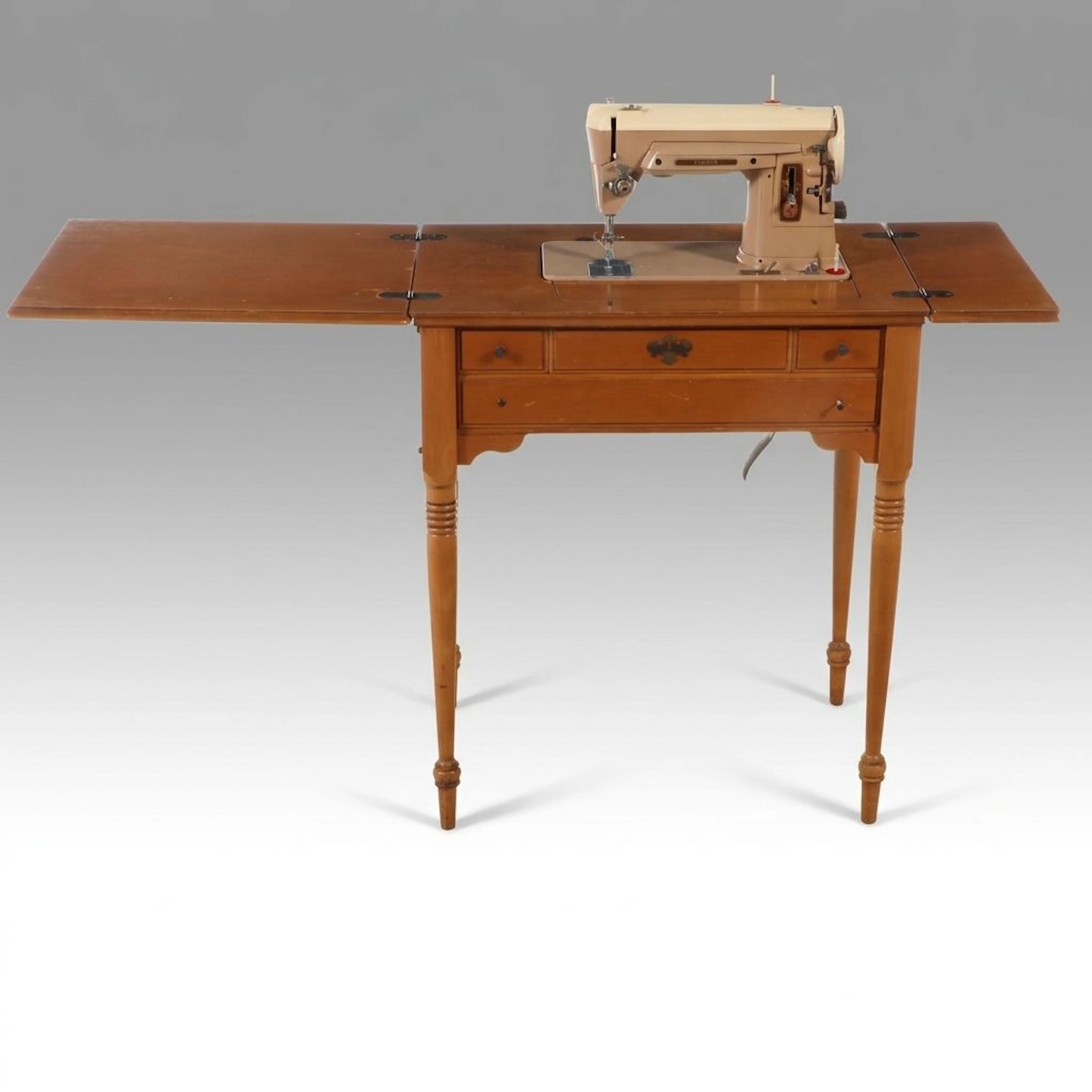 Singer Electric Sewing Machine in Maple Finish Cabinet, Mid-20th Century