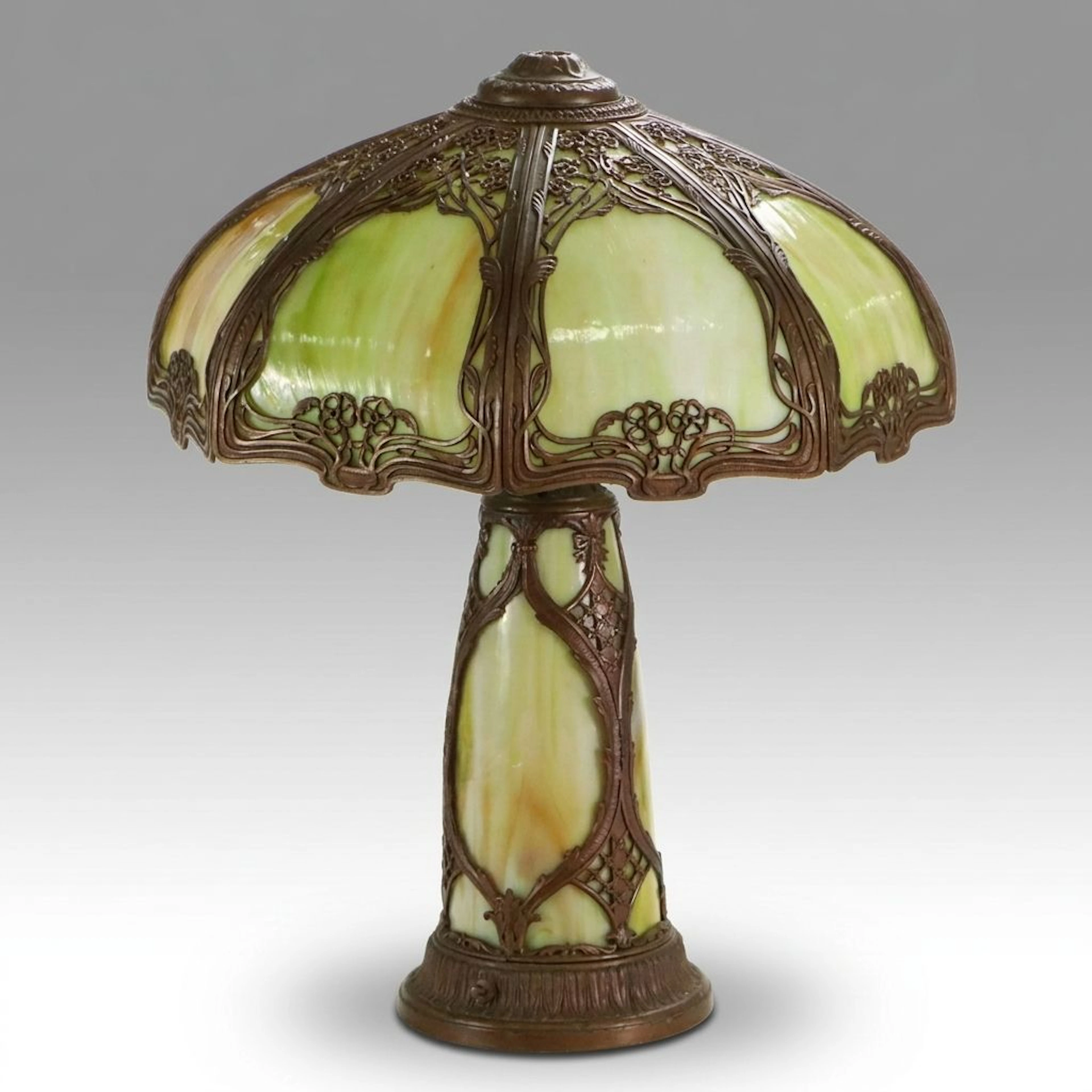 Art Nouveau Style Bronzed Spelter Table Lamp with Bent Panel Slag Glass Lamp
