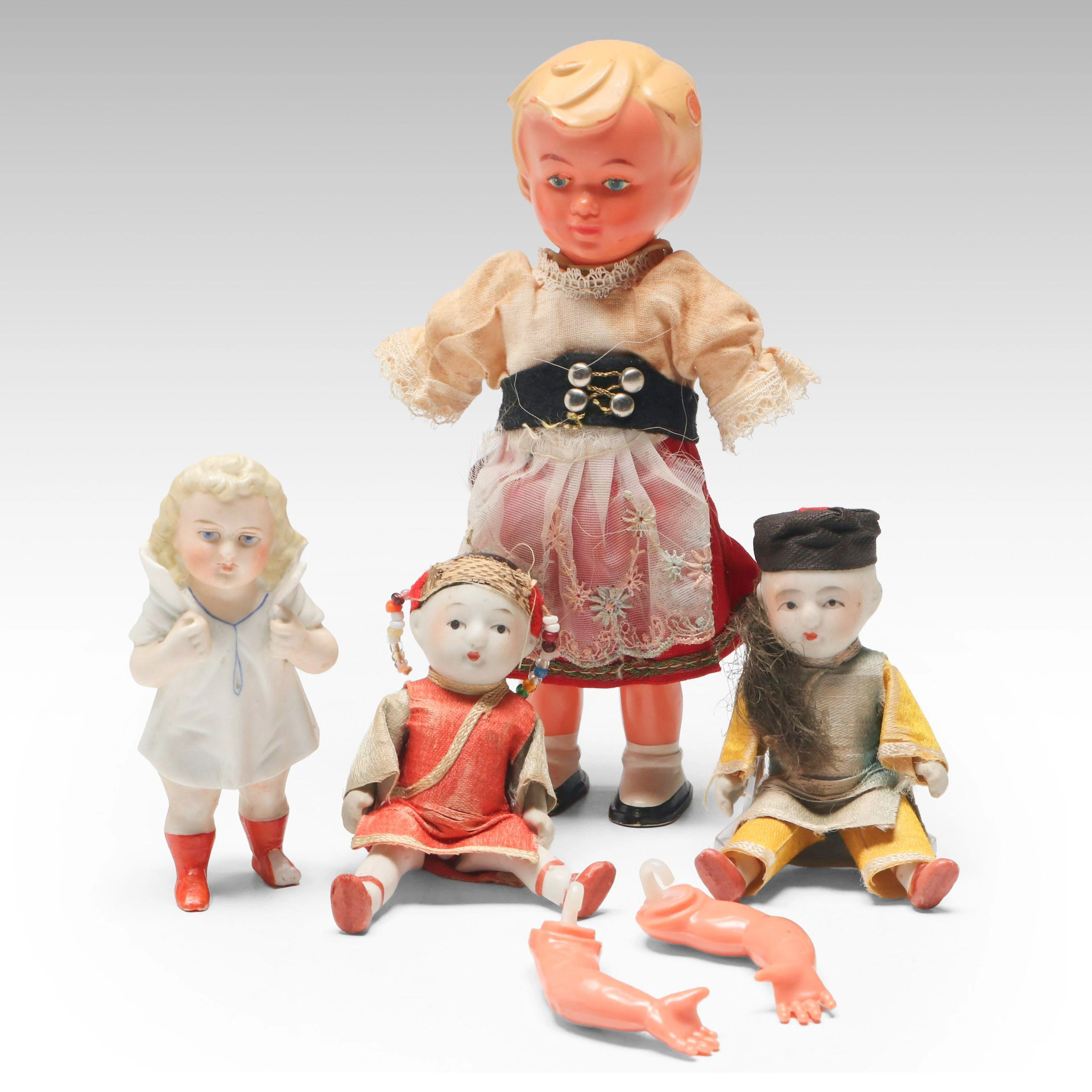 Victorian Bisque Figurine with Other Dolls, Early to Mid-20th Century