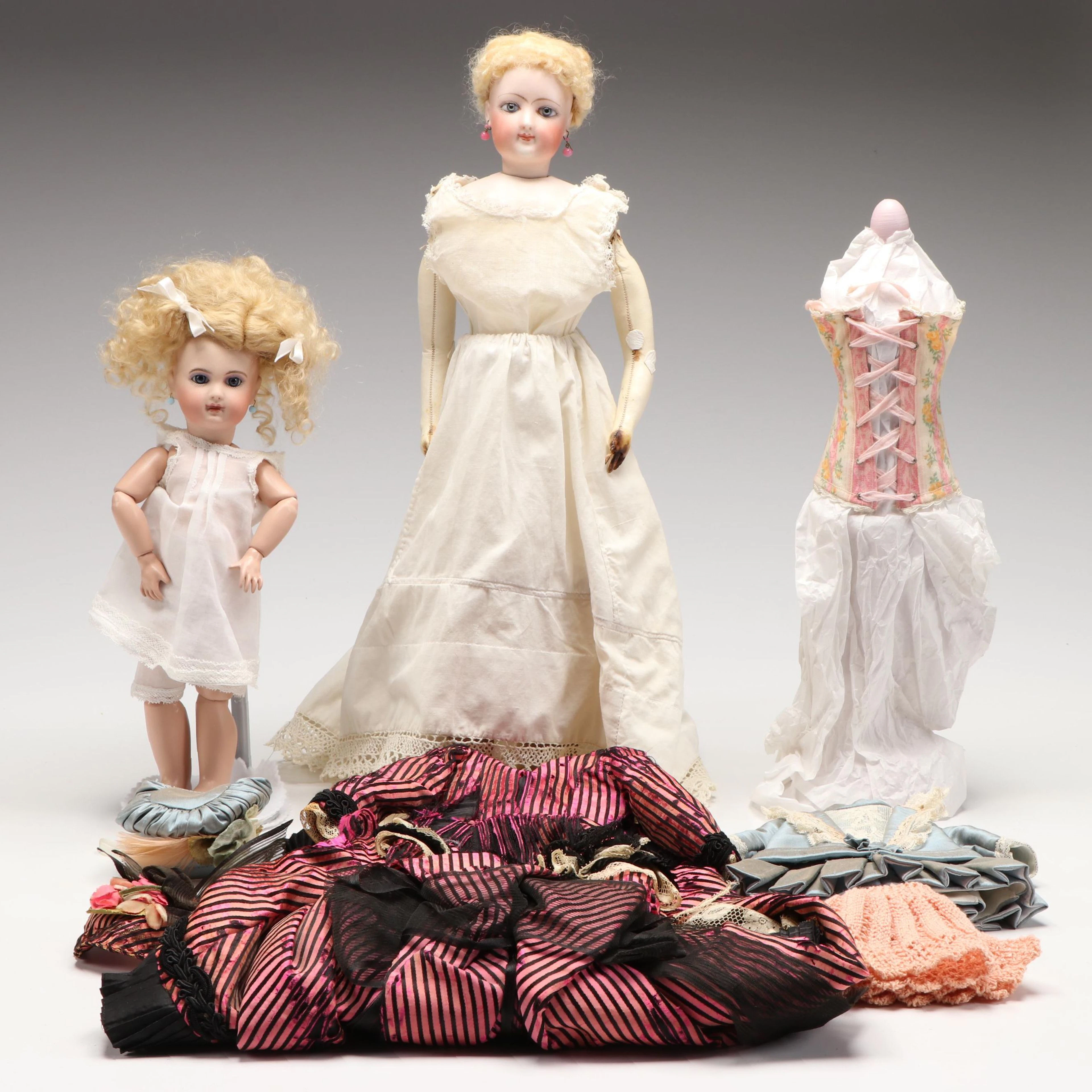 Reproduction Jumeau Doll and Other Bisque Leather Body Doll with Accessories