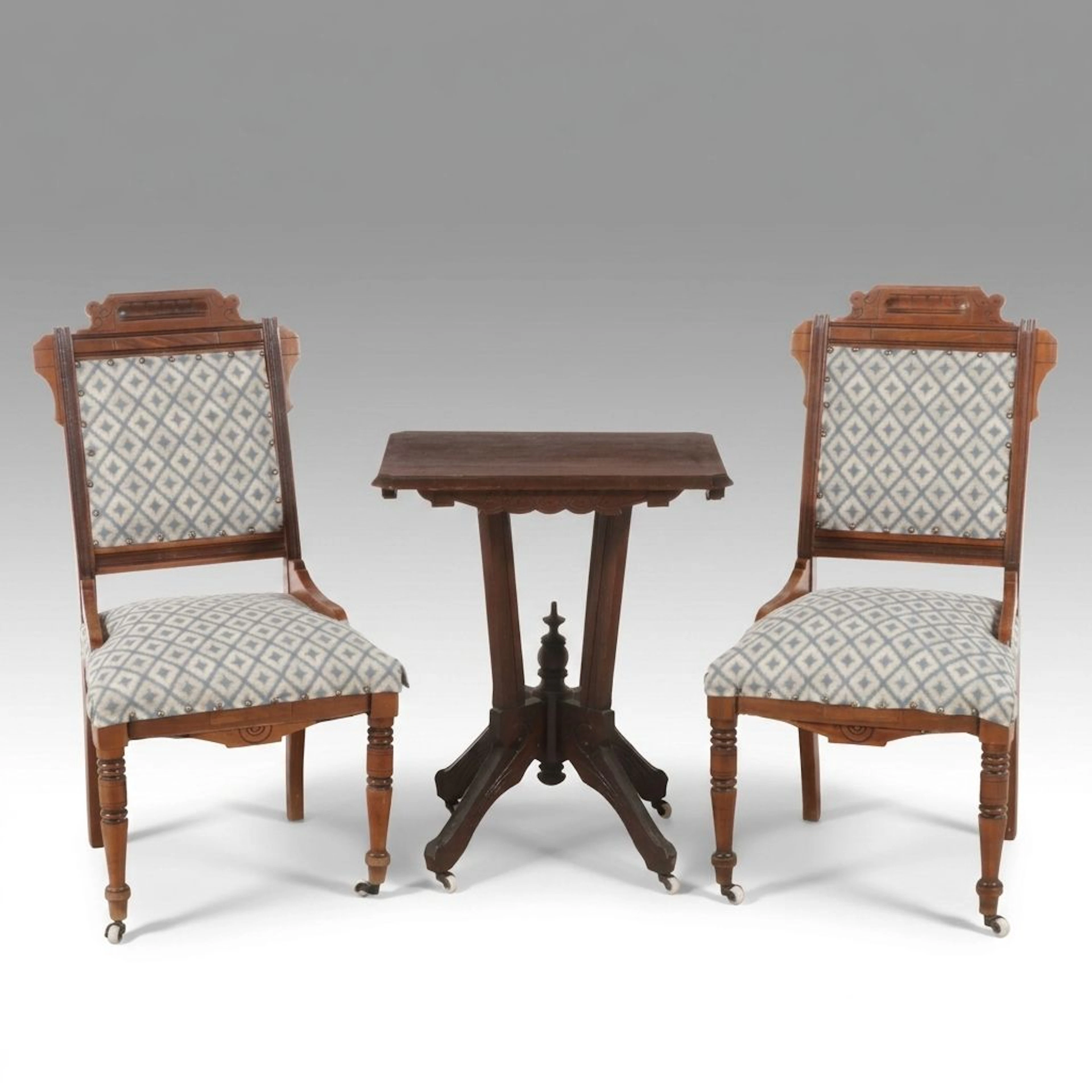 Eastlake Carved Walnut Side Chairs and Center Table, Late 19th Century