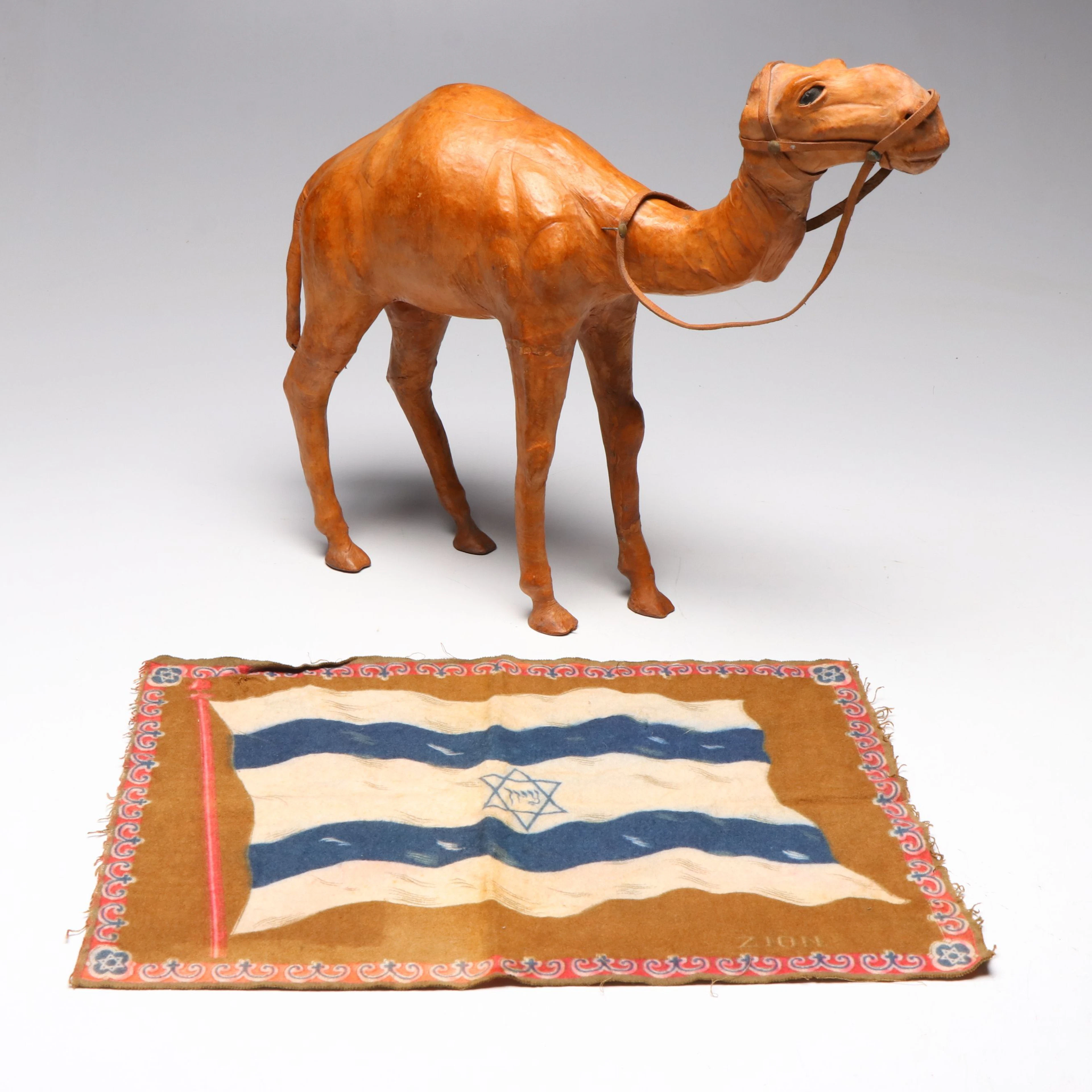 Leather Clad Camel Sculpture with "Zion" Cigar Flannel Flag